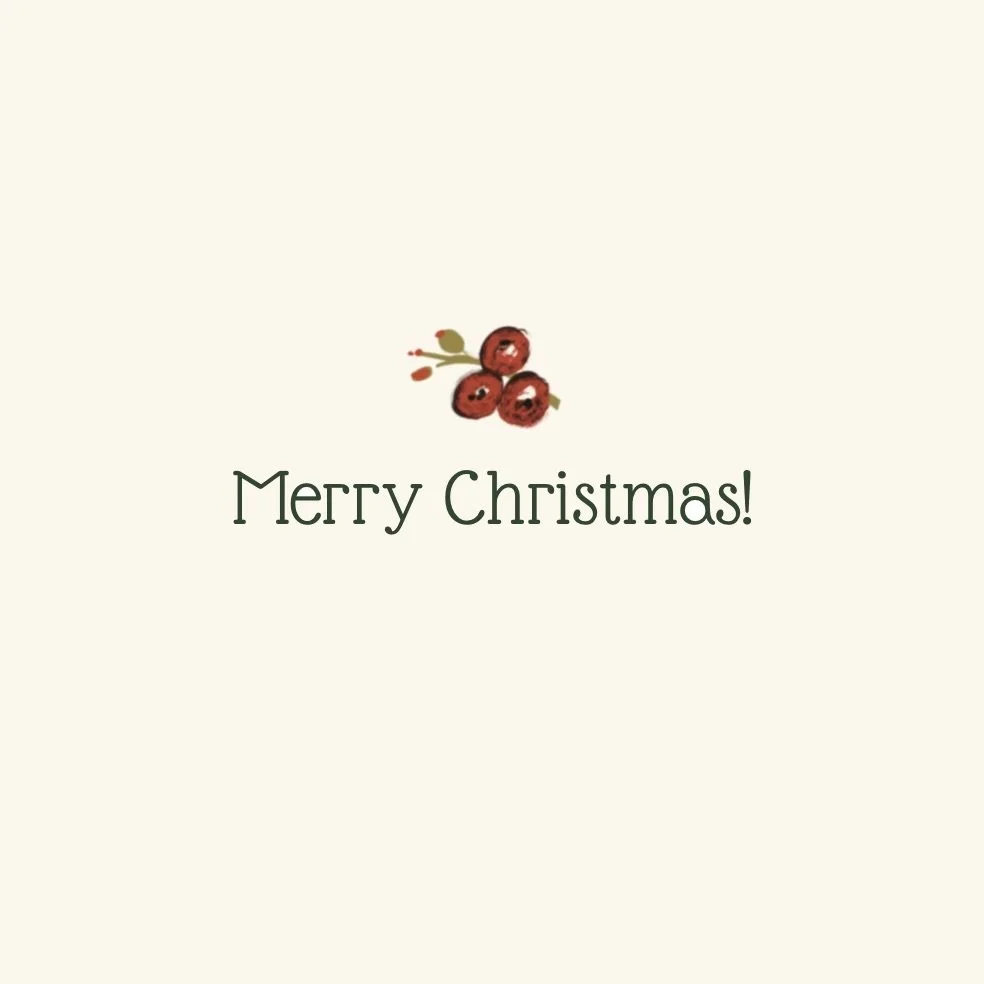 Detail of the inside of the Carrot Top Studio cardinal and holly Christmas card that says 'Merry Christmas!'