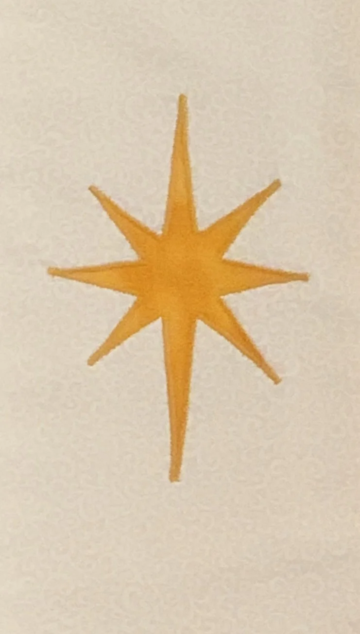 Star of Bethlehem appliquéd on fabric by Carrot Top Studio for a clergy stole appropriate for Christmas and Epiphany.