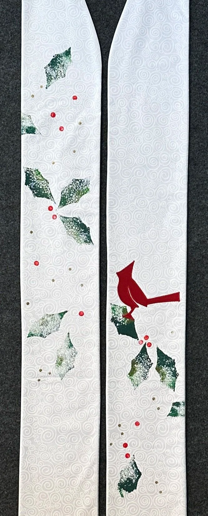 A white stole for Christmas worship for clergy and pastors with holly leaves and a red cardinal.
