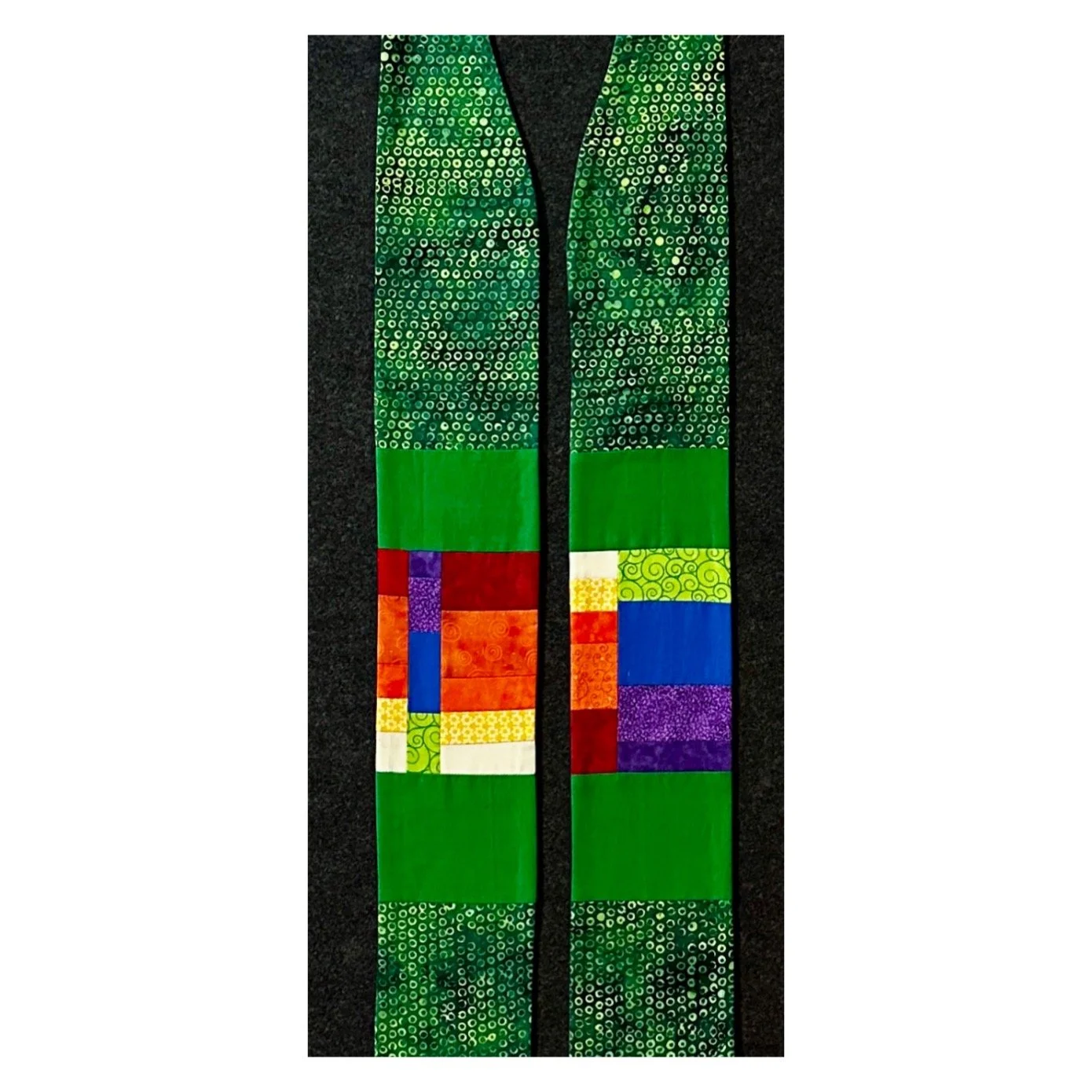A green chaplain length stole with a rainbow border is unique and artistic by Carrot Top Studio.