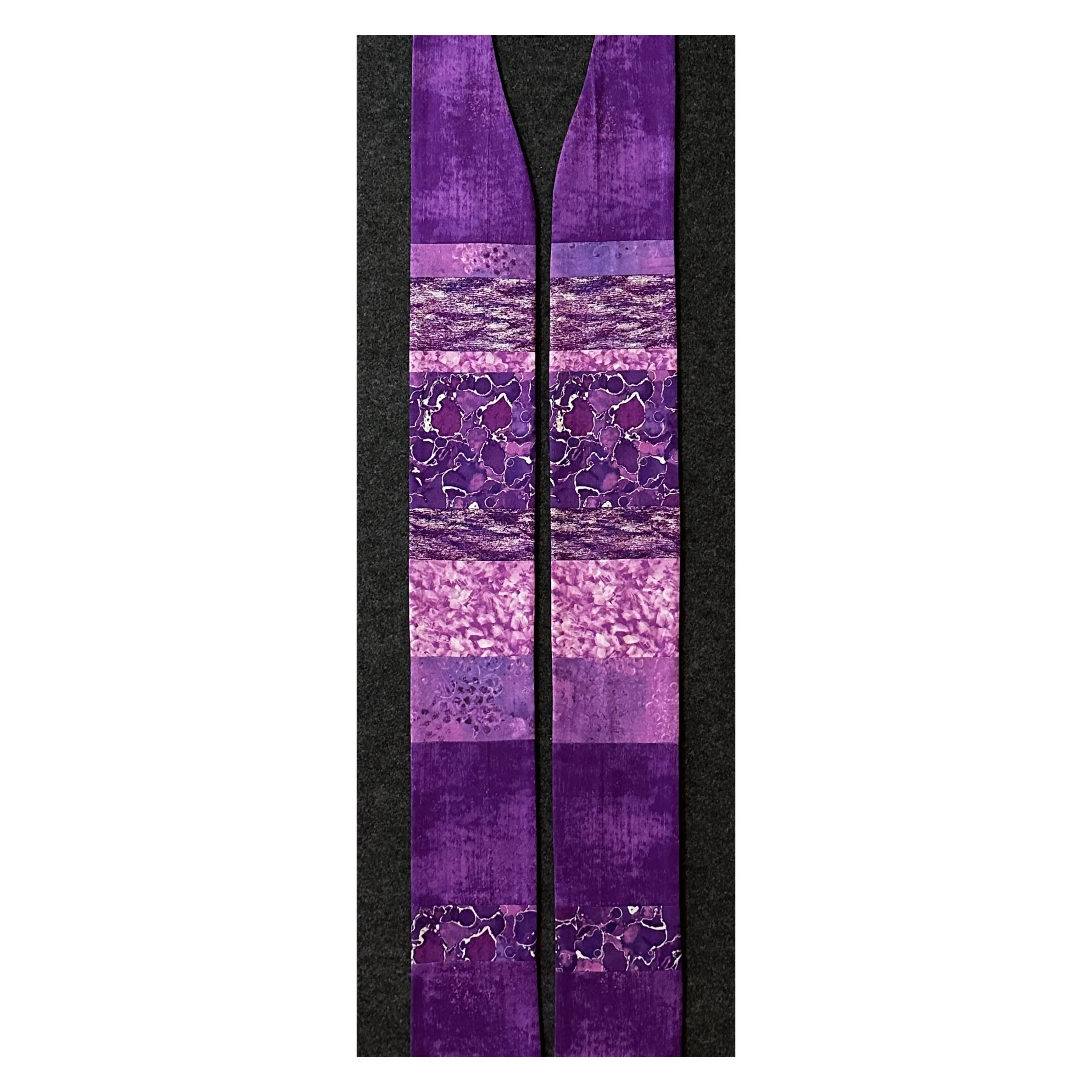 This Advent stole in purple is sold at Carrot Top Studio and emphasizes the stages of preparation during this season.