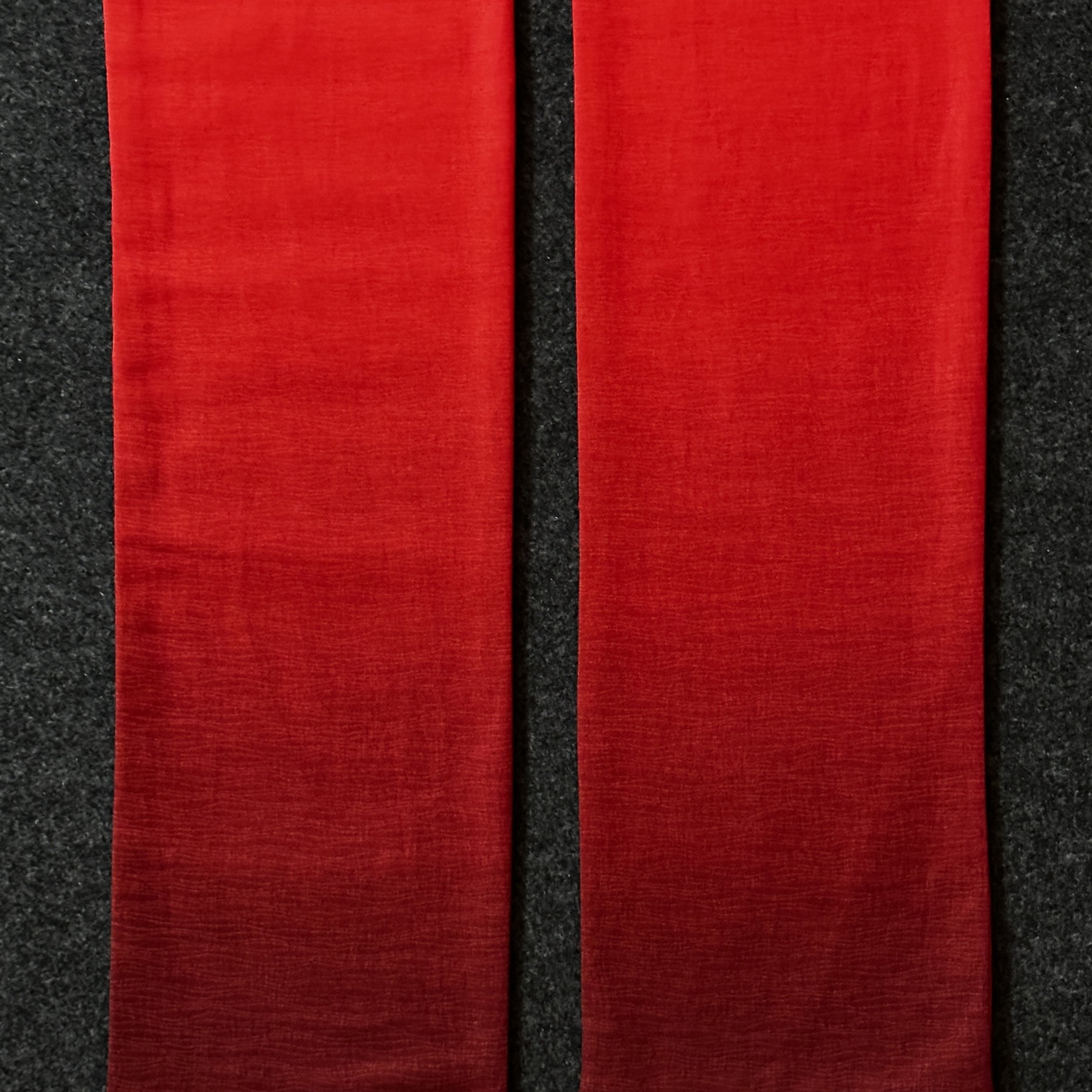 Red clergy stole with ombre fabric close up.