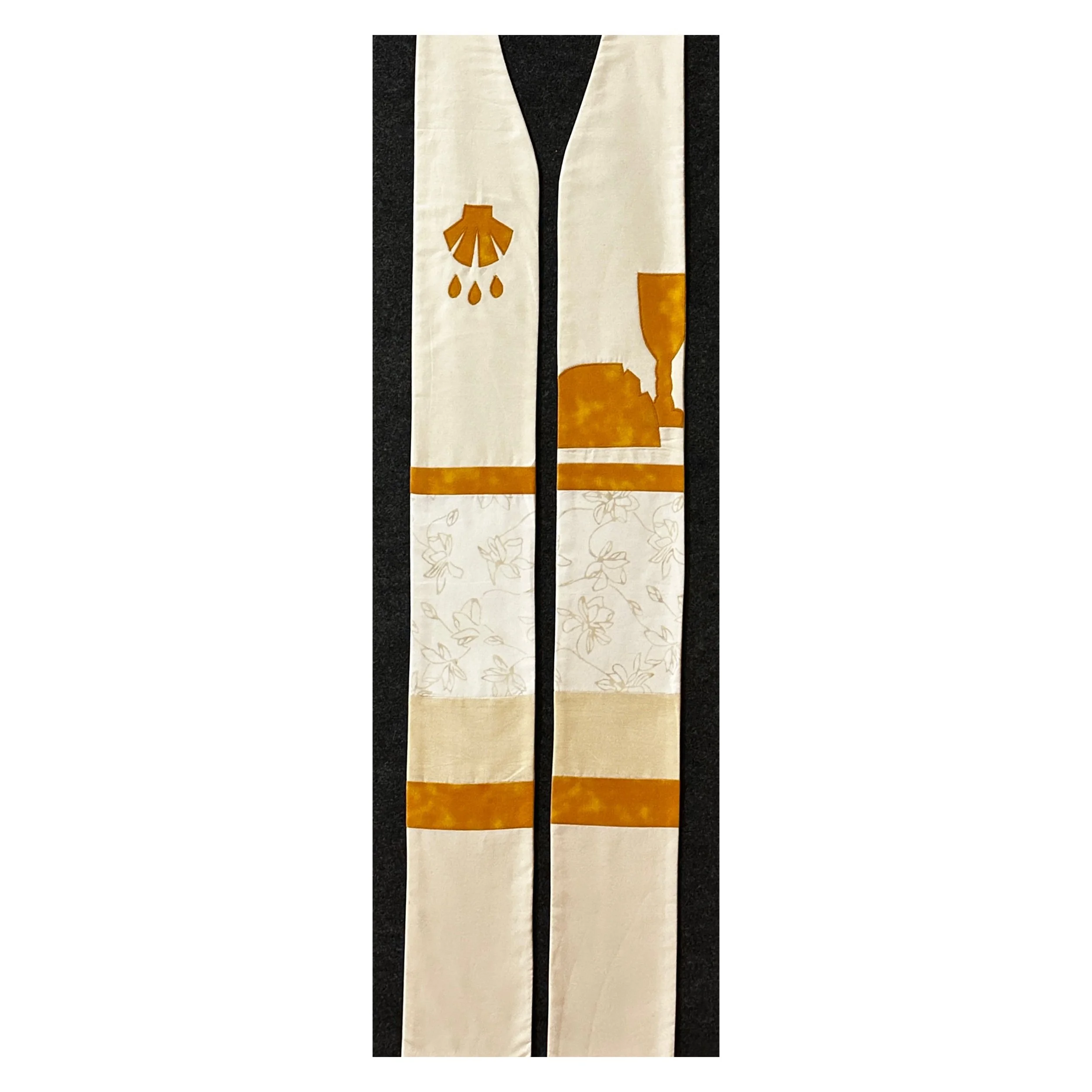 A creamy white stole representing the sacraments with Baptism and Communion symbols by Carrot Top Studio.