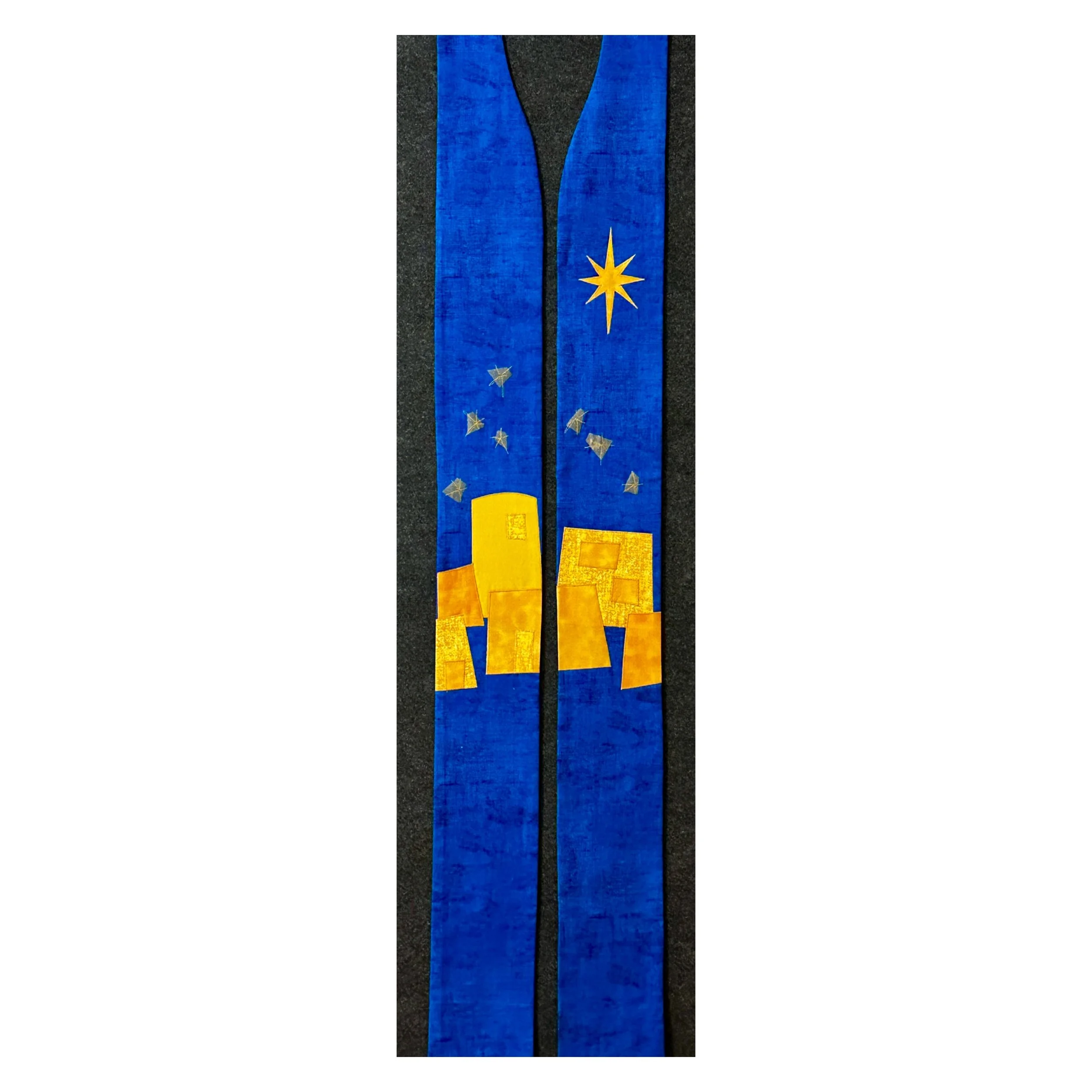 A blue Advent clergy stole that is extra long with a border of the little town of bethlehem was created by carrot top studio.