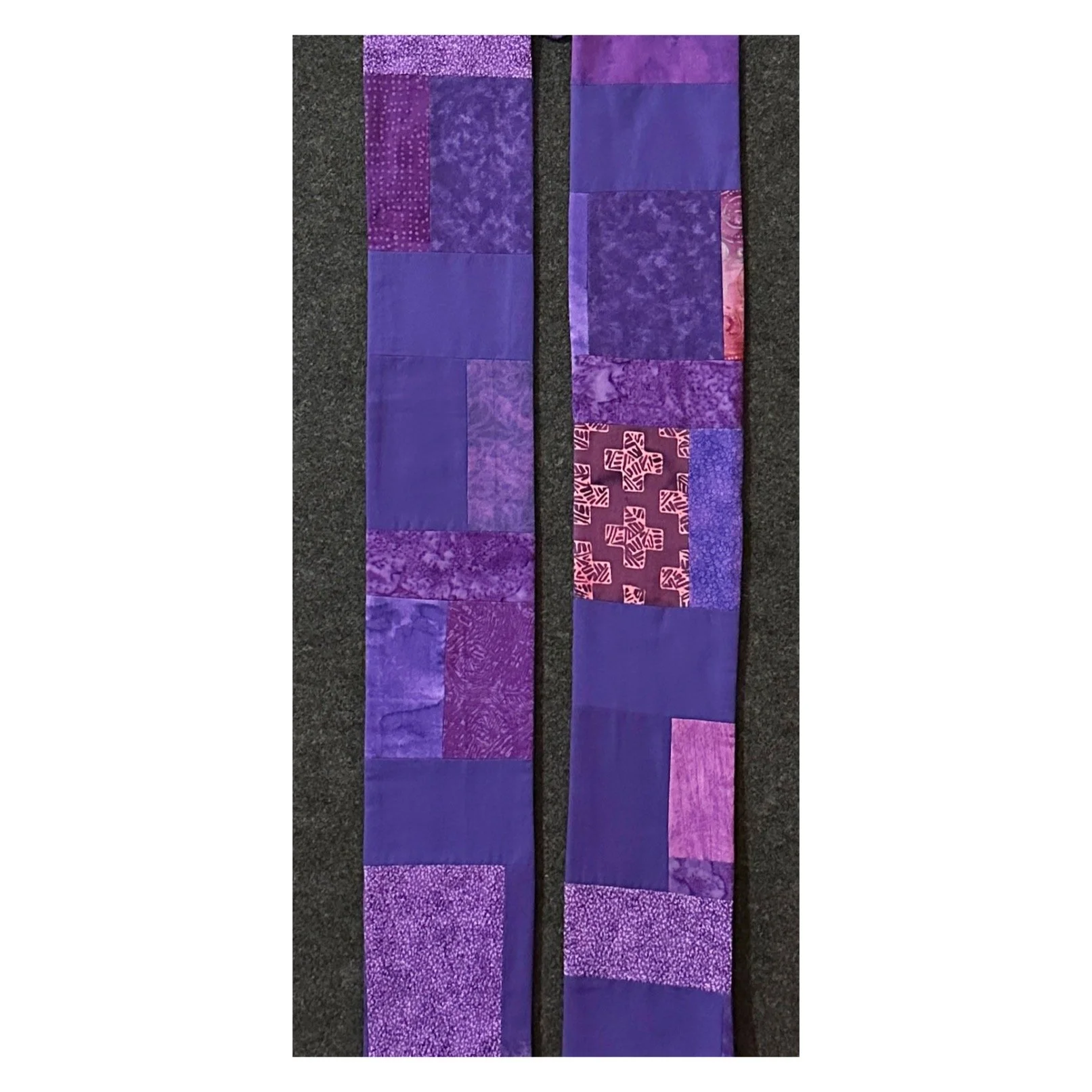 Beautifully handcrafted purple chaplain stole for Advent and Lent. Pieced fabrics symbolize waiting, reflection, and renewal for these sacred seasons.