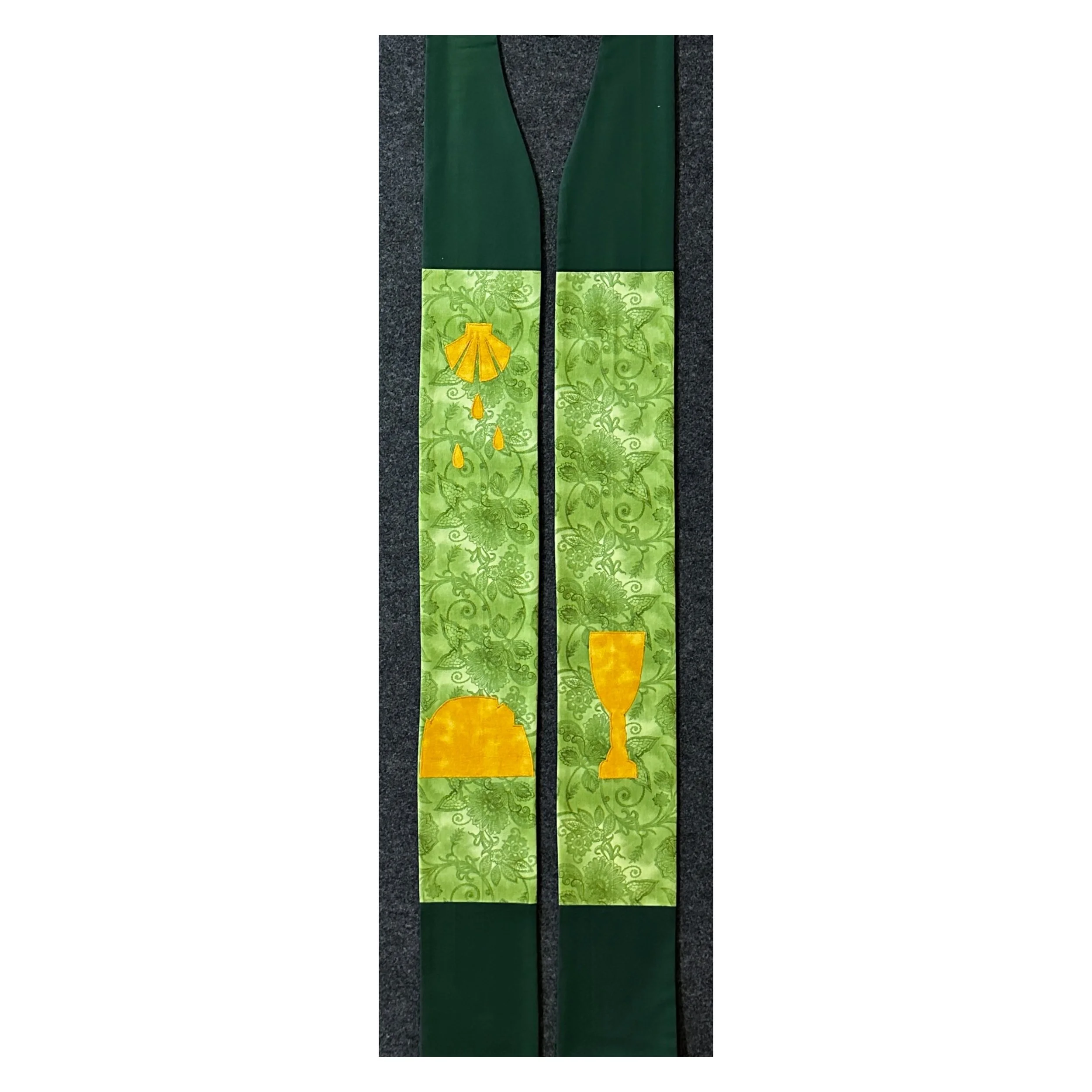 A green ordinary time stole with symbols of the sacraments by Carrot Top Studio.