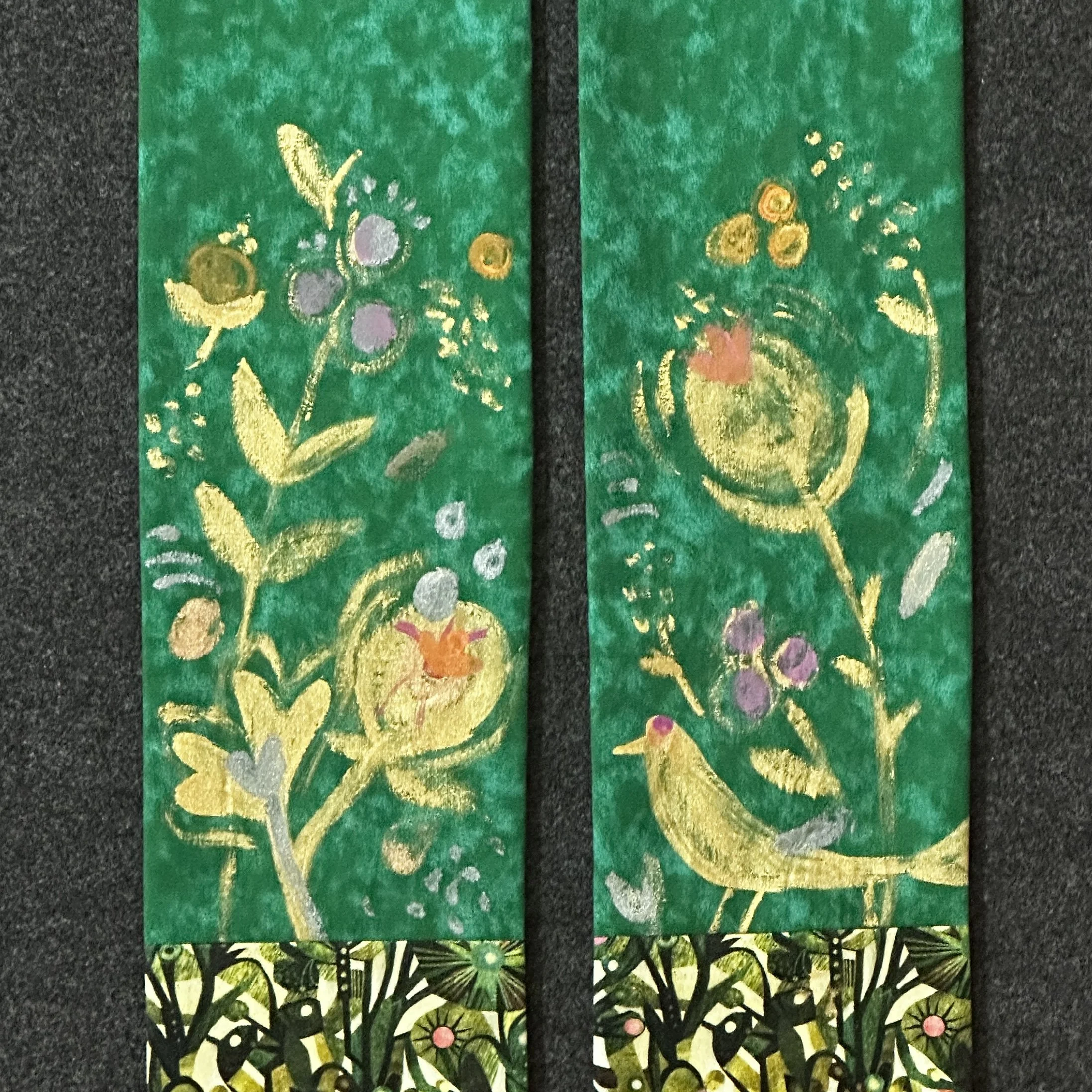 Detail of a green clergy stole with birds and florals by Carrot Top Studio.