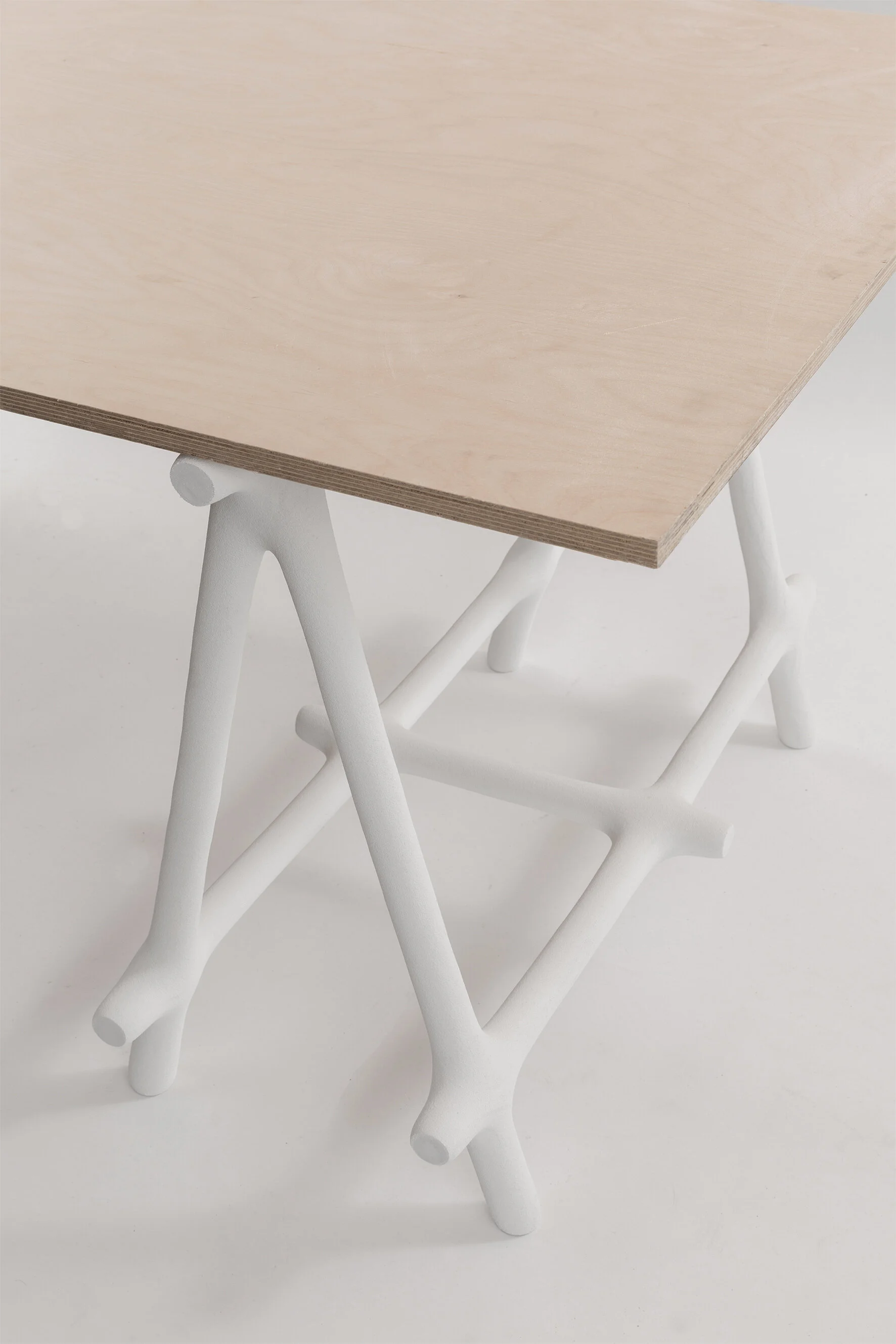 Hot Wire Extensions' Basic Trestle. A set of trestle's finished with polyurea in white