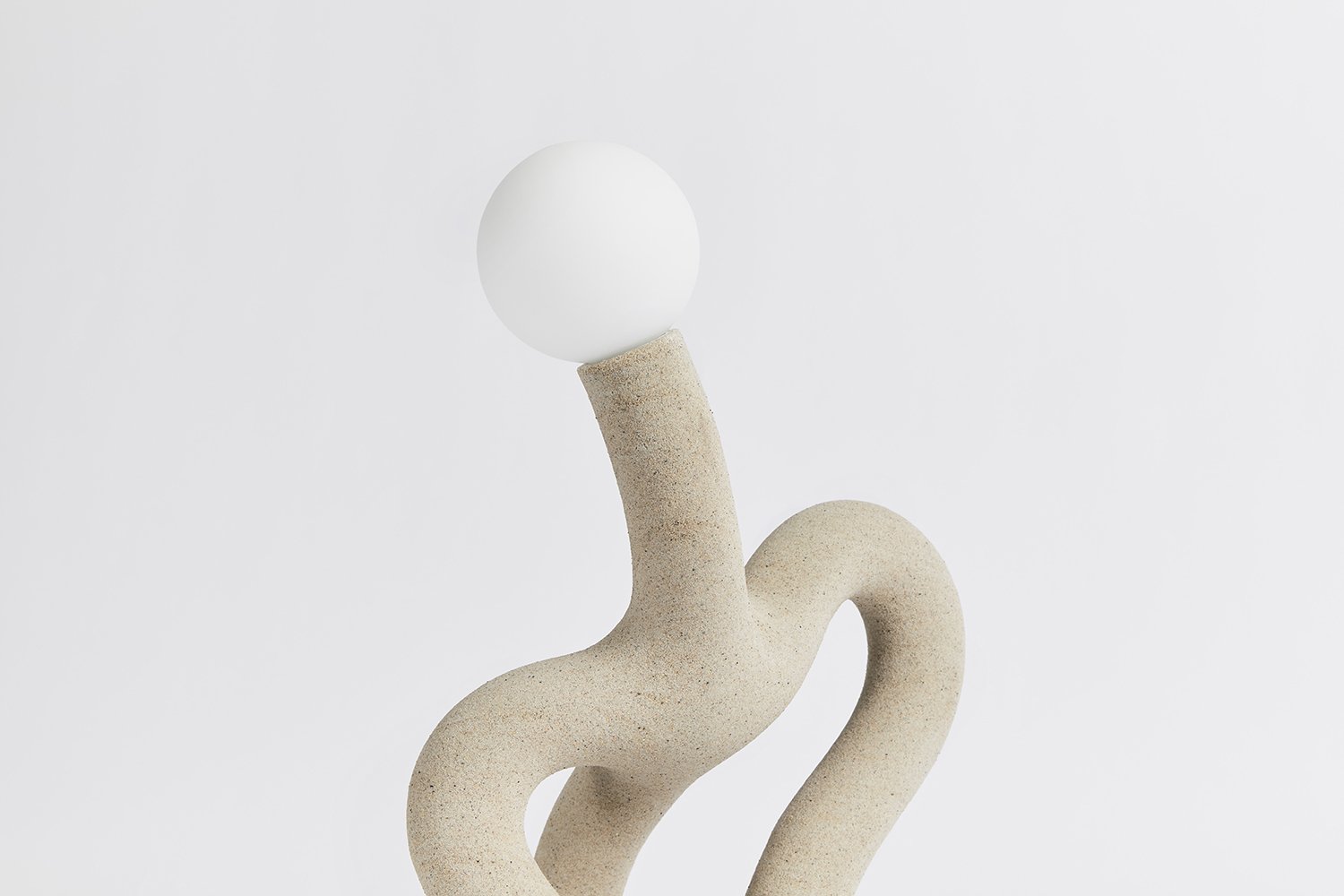 Hot Wire Extensions Native Light 13. A desk light with natural textile cable and a raw, sealed finish