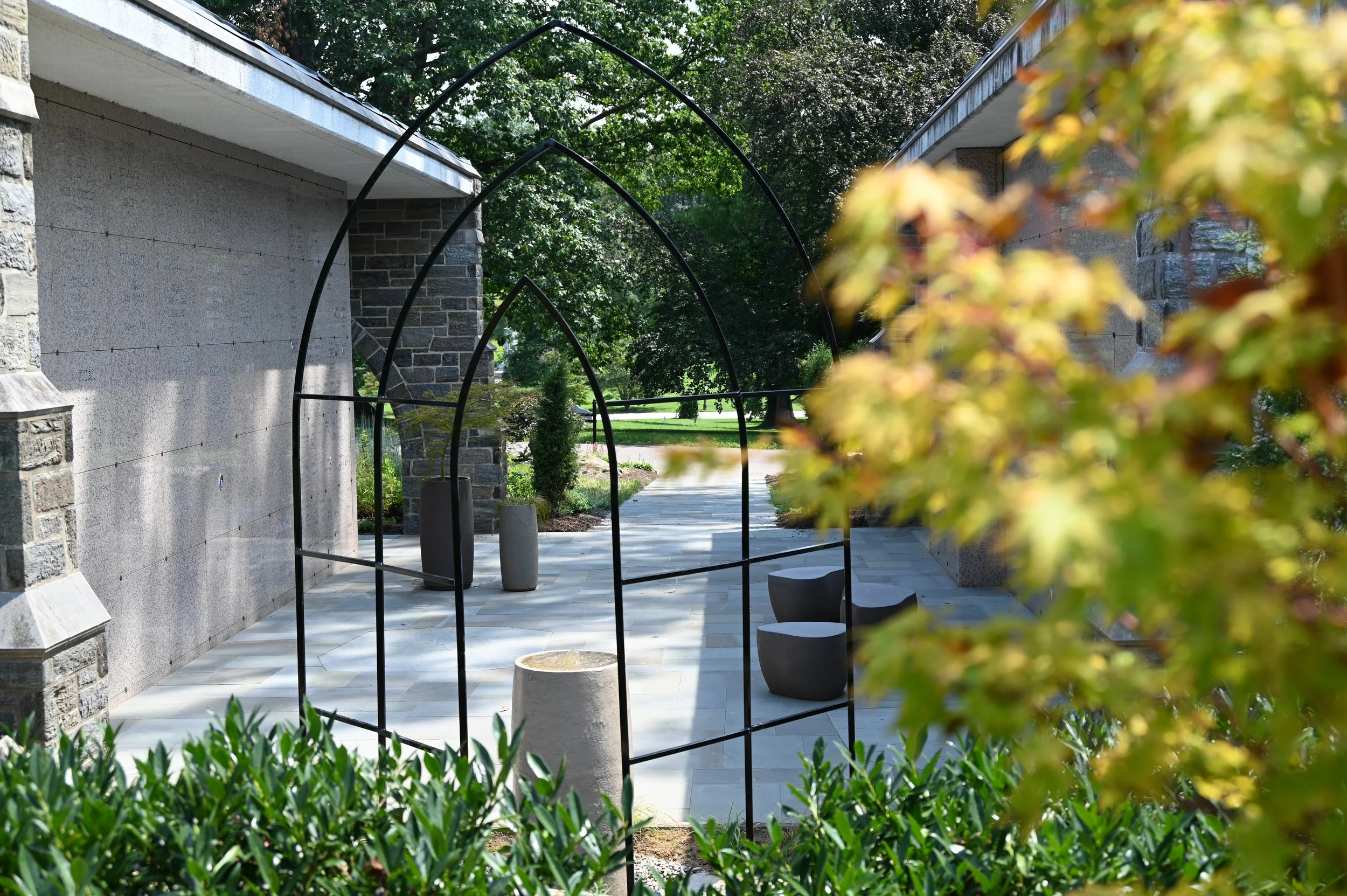 The fountain with trellis as focal point along the entry axis