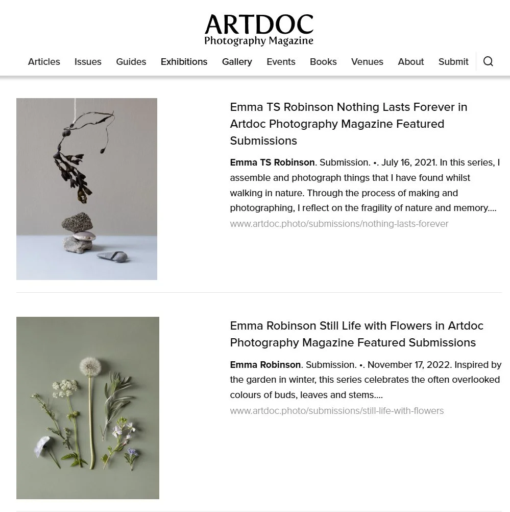 Screenshot of ARTDOC Photography Magazine webpage featuring two photographic art submissions by Emma TS Robinson. The first image shows a minimalist arrangement of stones and dried plants. The second image displays various pressed flowers and leaves arranged on a green background.