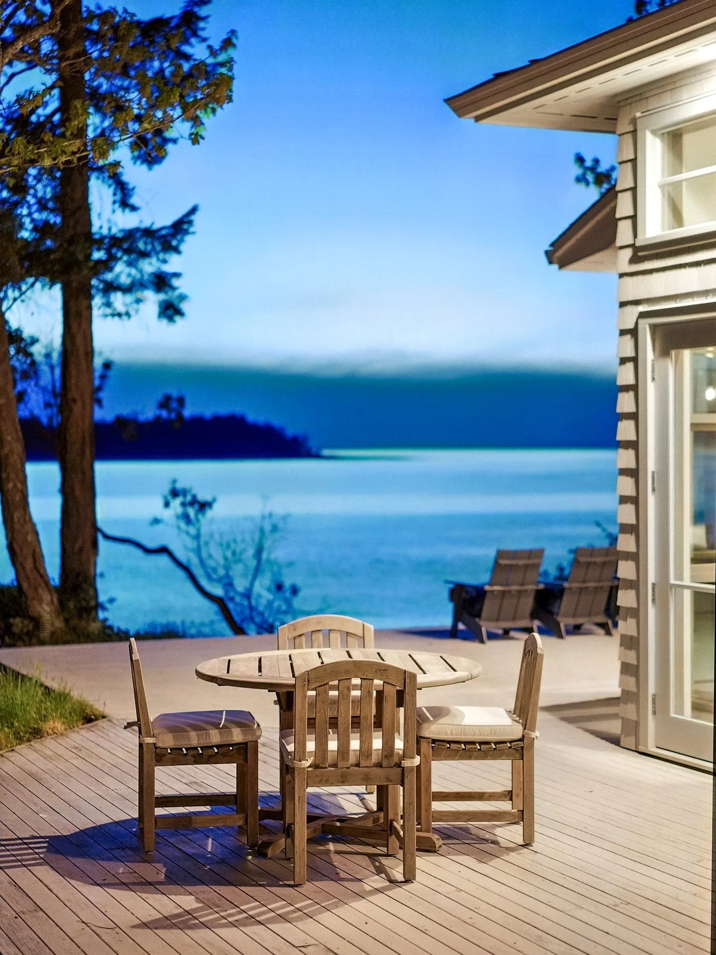 Exterior lighting is what transforms an outdoor space from simple to spectacular &mdash; extending its beauty and functionality through every season.

At this Madrona Point custom home, our clients wanted to fully embrace their incredible views year-