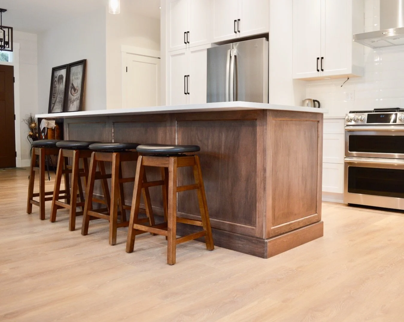 A contrasting island remains a powerful way to add visual interest to a kitchen design, and we always encourage our clients to explore their creativity and let it shine through in their custom space.