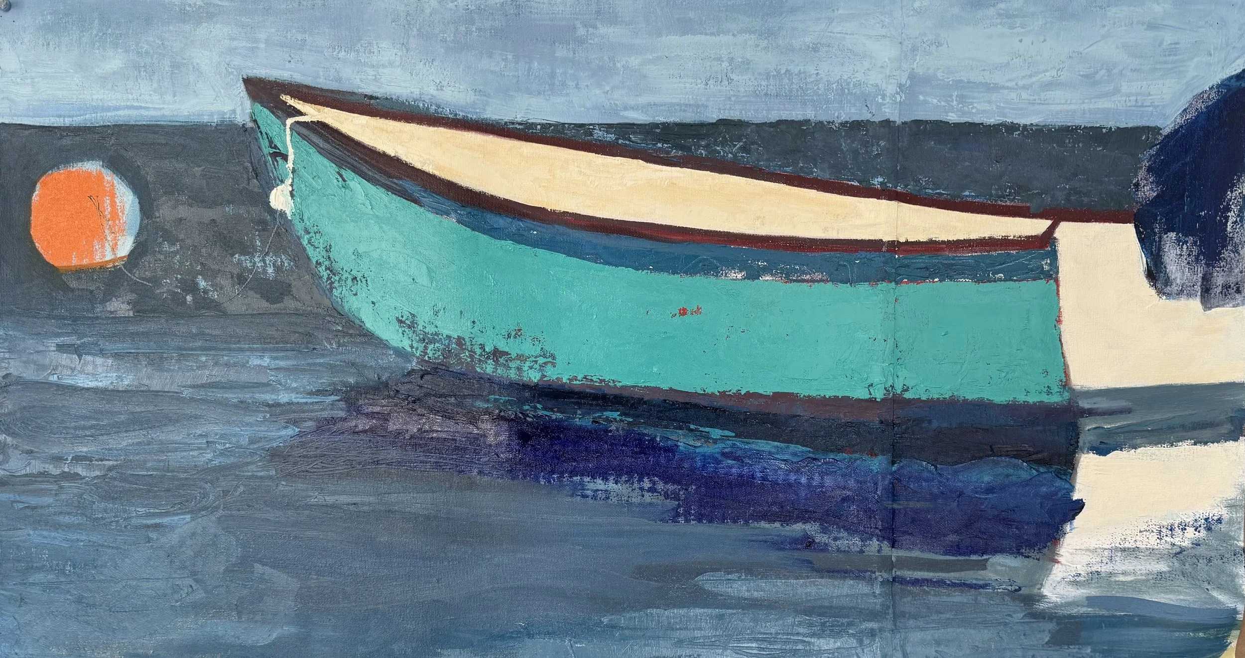 Small turquoise boat floating tethered to buoy.