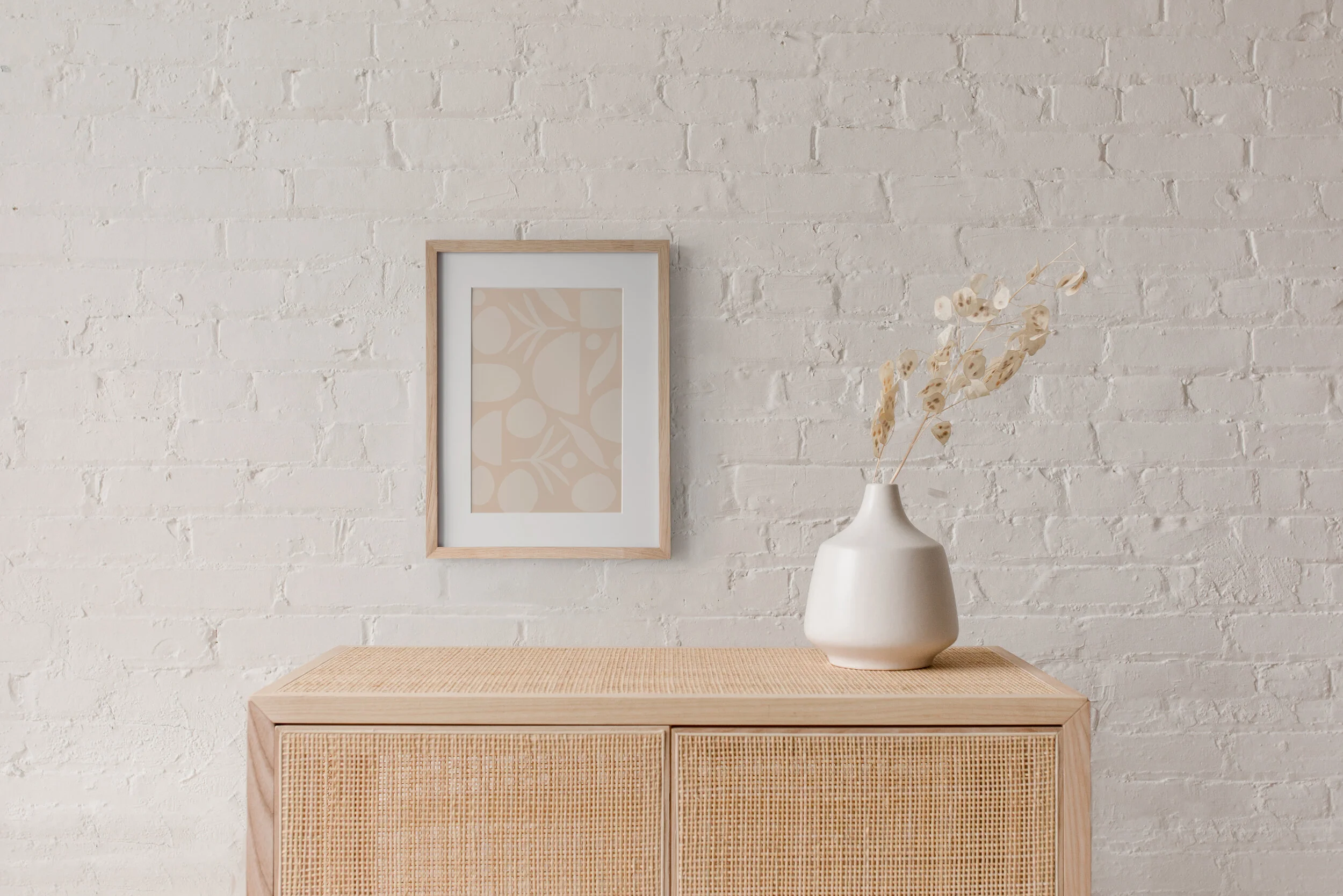 A decorative wall plant design positioned above a console table, creating a sophisticated and calming atmosphere for EMDR therapy sessions in Denver.