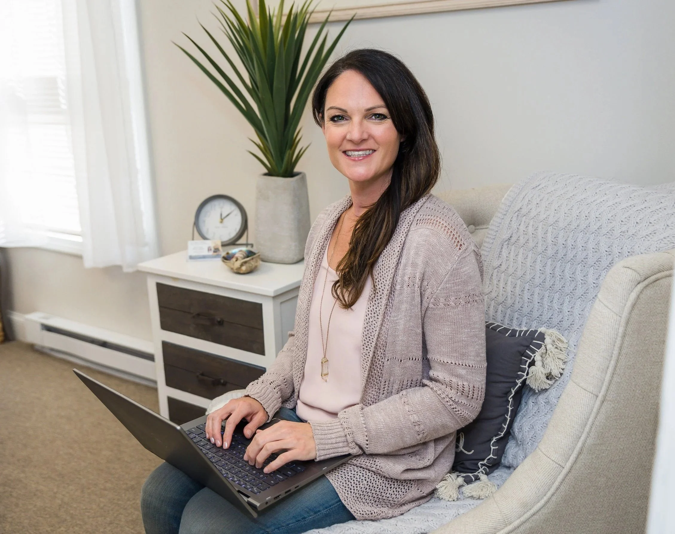 Lisa Kern Reiki Master and Holistic Therapist smiling and supporting clients