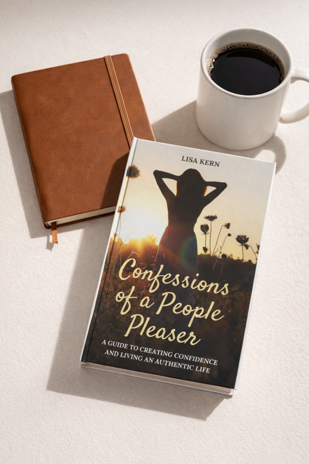 Lisa Kern enjoying a cup of coffee while reading Confessions of a People Pleaser
