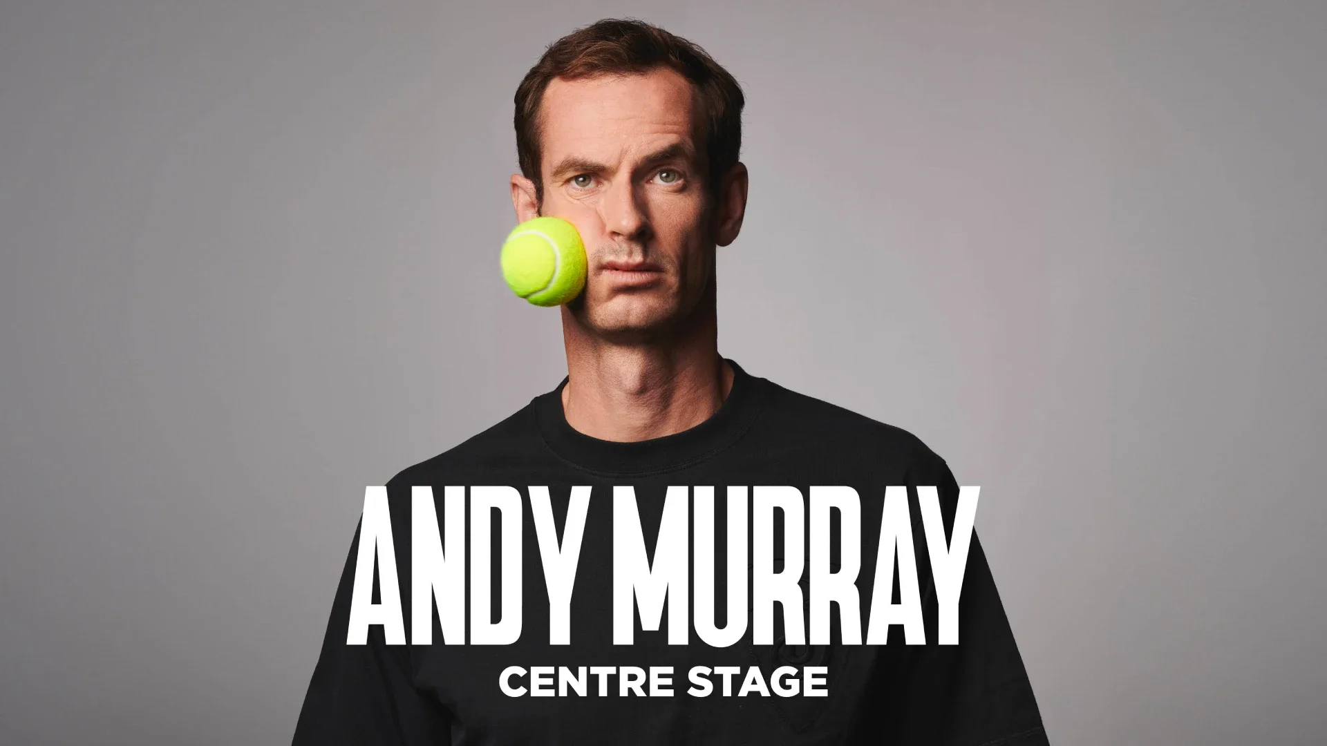 Promotional poster featuring comedian Andy Murray with a tennis ball on his cheek and text announcing a centre stage performance.