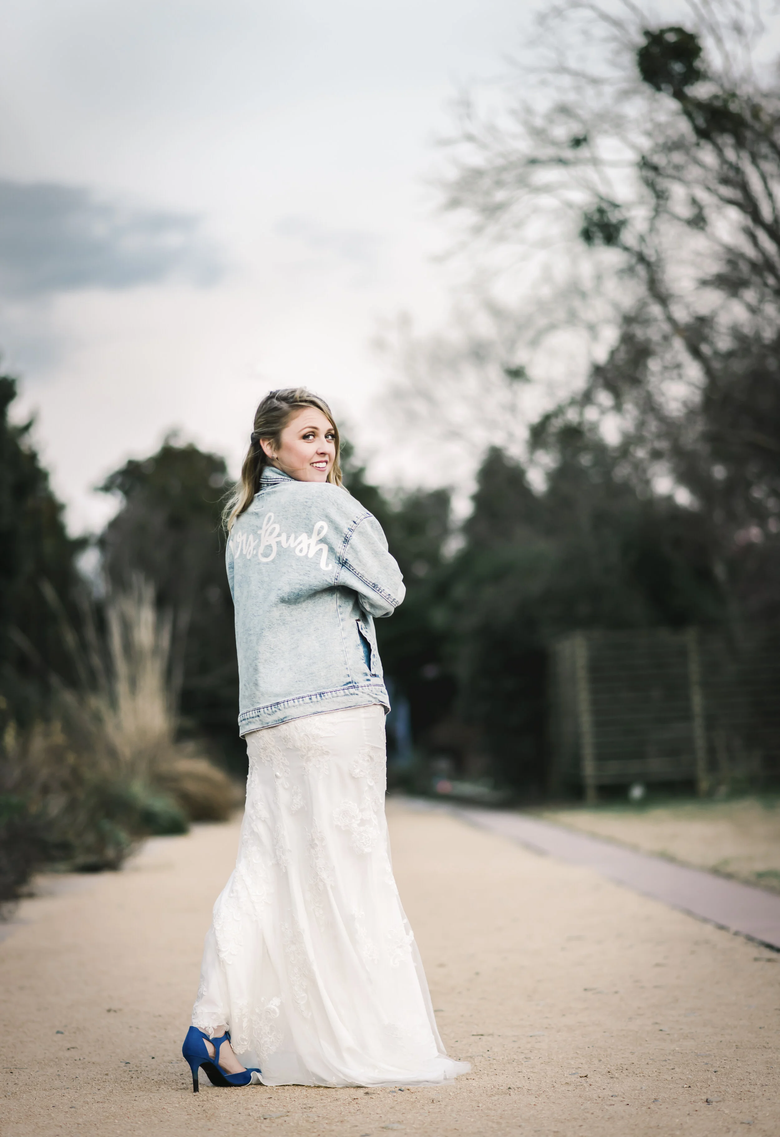 Bridal portrait in custom jacket with new married name