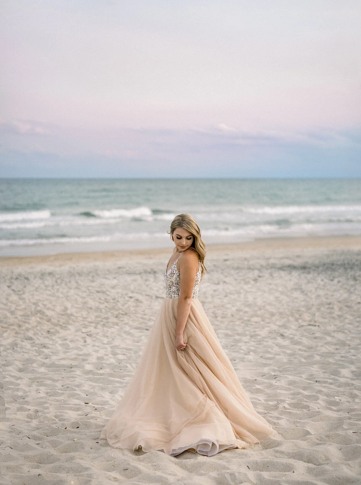Bride swinging BHLDN gown in Topsail Beach