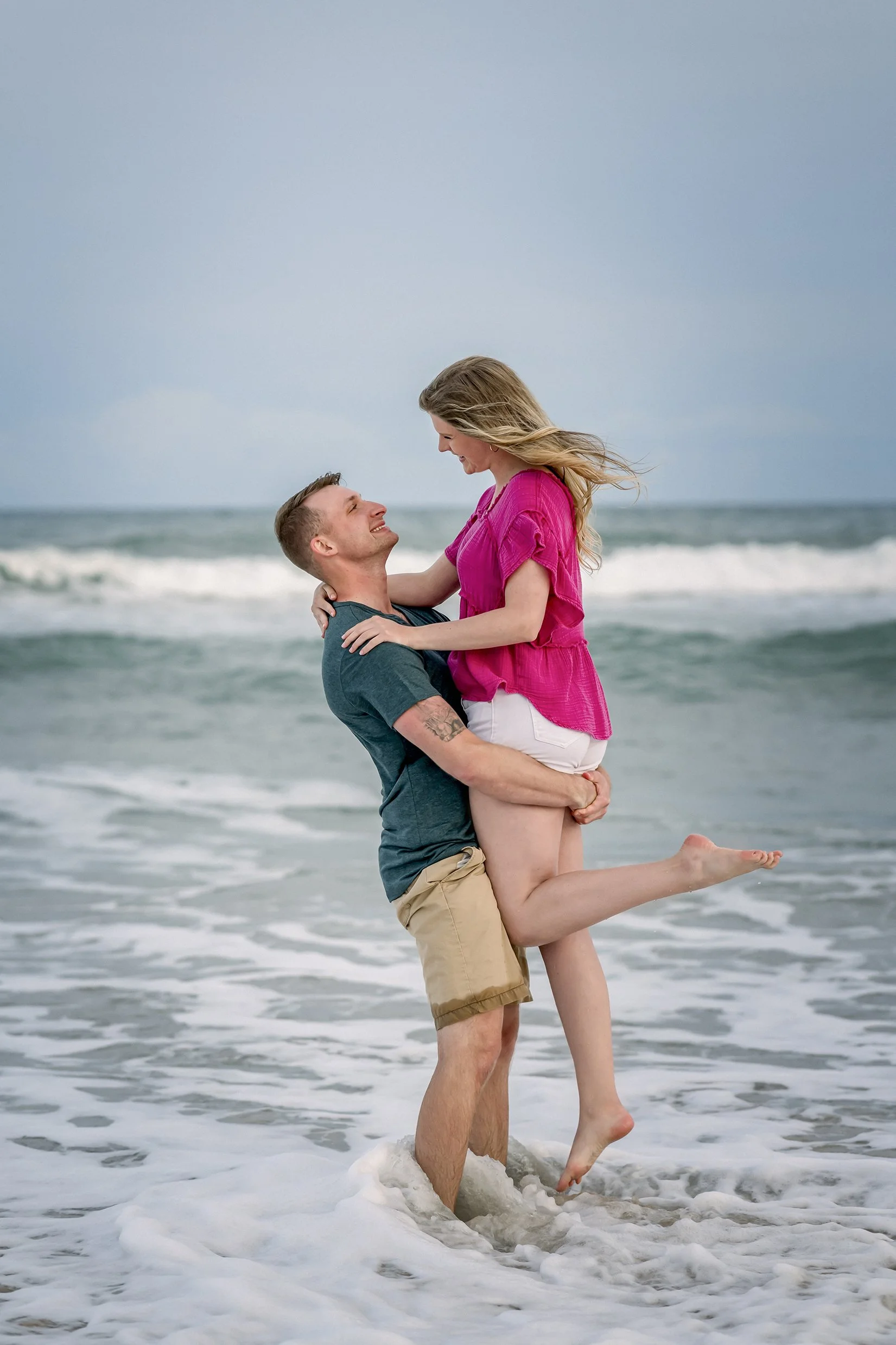 Couple Splashing Surf City June 21 WEB.jpg