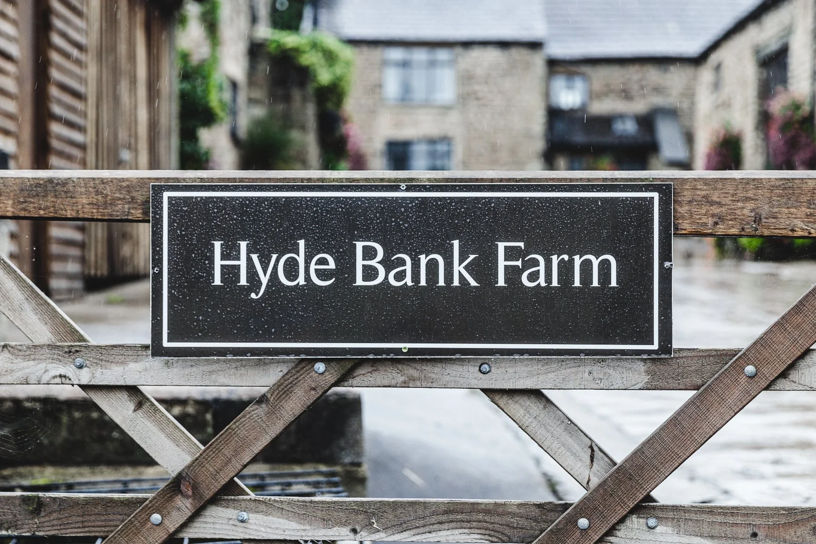 Entrance signage to Hyde Bank Farm wedding venue in Greater Manchester