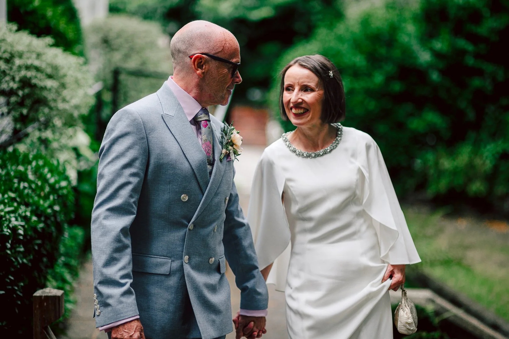 bride and groom arrive for their wedding reception at Didsbury House Hotel
