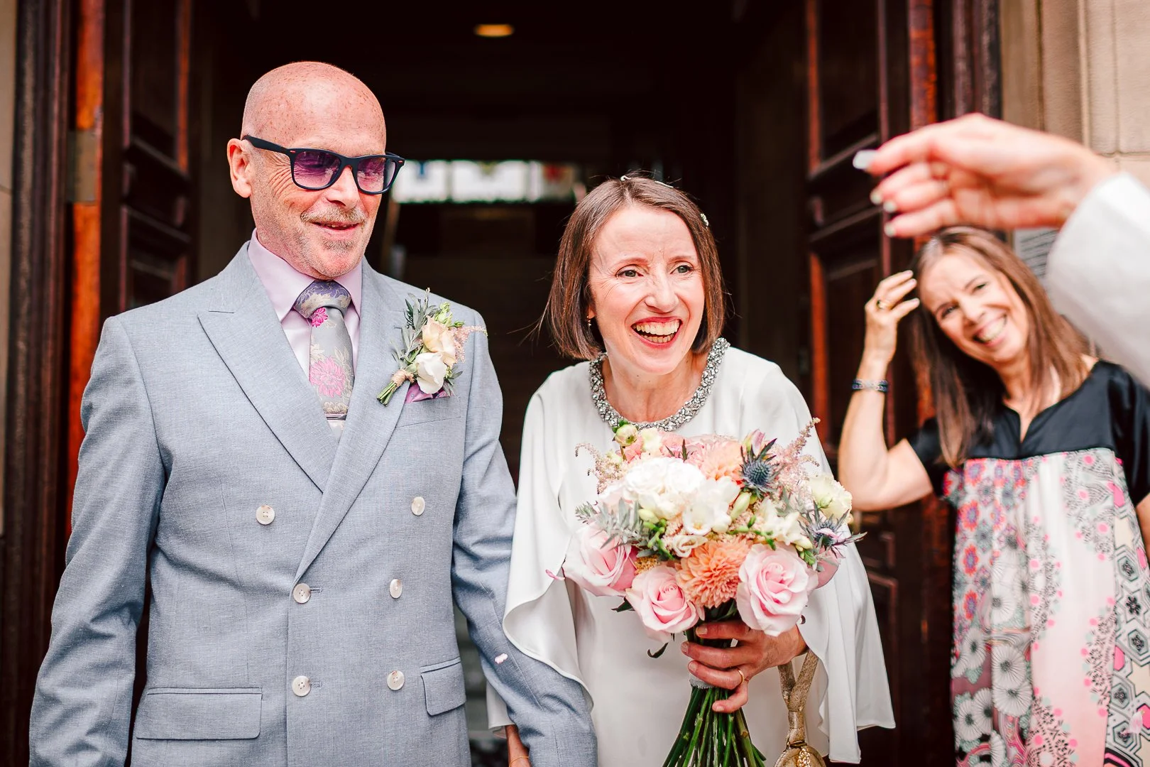 newlyweds Dave and Alison leave Sale Town Hall after their wedding ceremony at Sale Town Hall