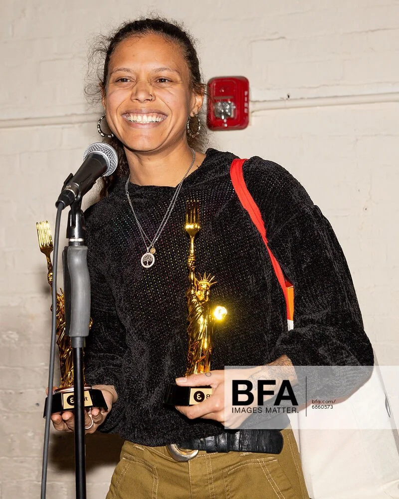  Lana Lagomarsini accepting on behalf of herself and Nana Araba 