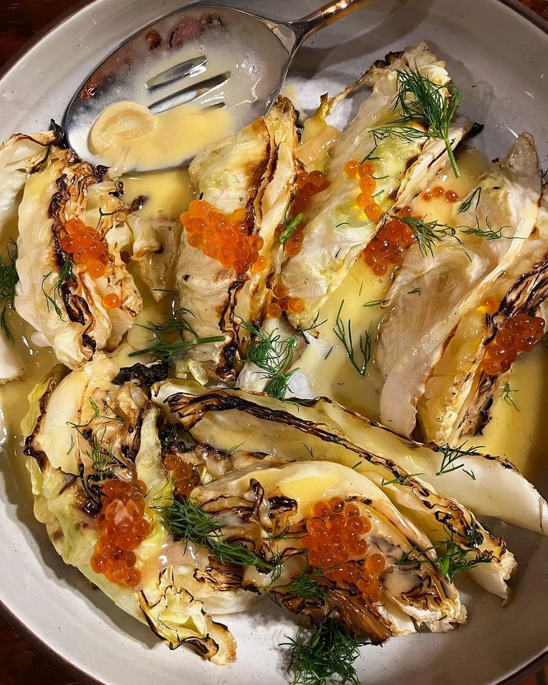 Cabbage with beurre blanc and salmon roe 📸: :@lana_cooks