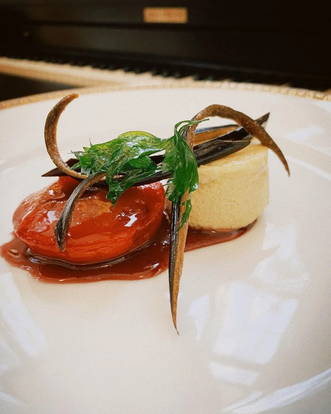 Corn ground cherry custard with baked plum from a previous Din Din. (photo from @dindin_nyc)