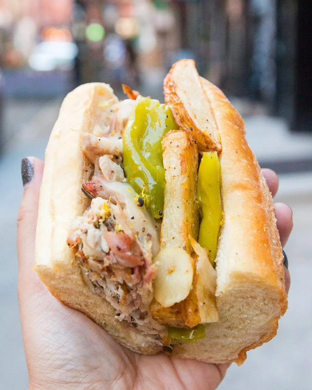  Porchetta sandwich by Chef Angelo Competiello (photo by @louie.the.foodie) 