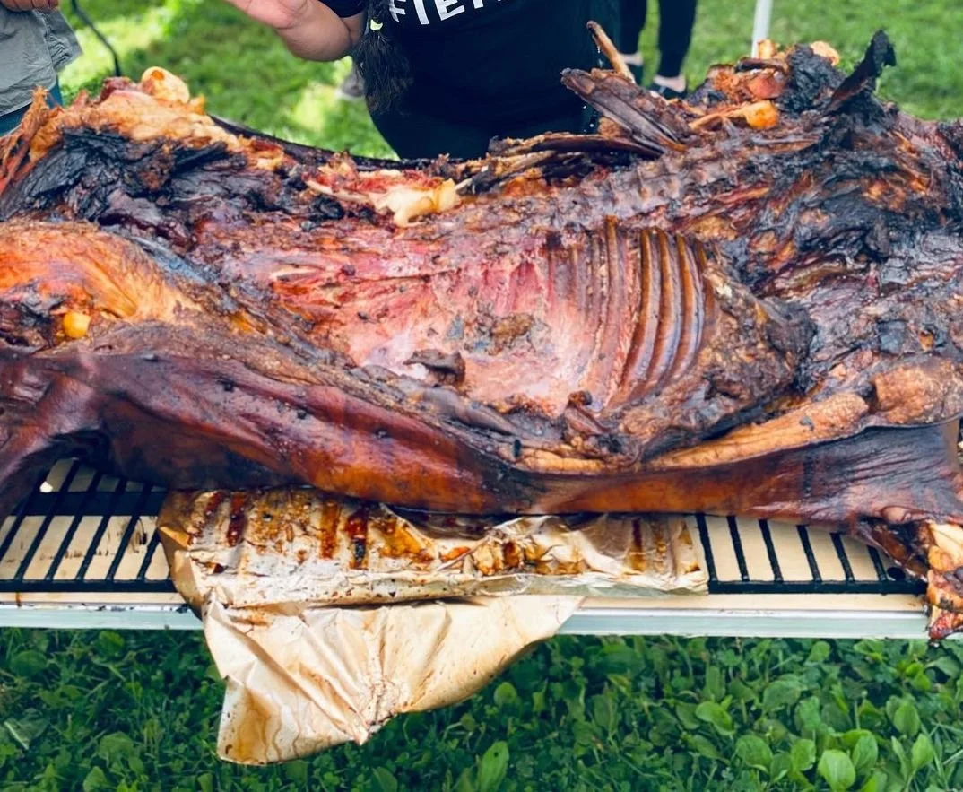  Whole Pig at a previous festival. (photo from @yeahfoodbeer and @pigislandnyc) 