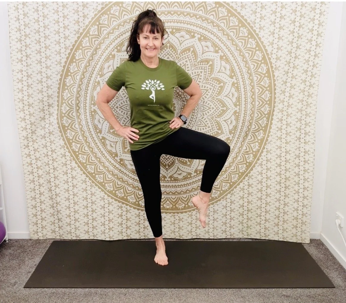 Jodie demonstrating a standing balance exercise for strength and posture