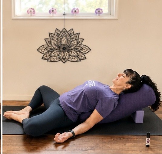 Jodie demonstrating the recline butterfly yoga pose to deeply relax