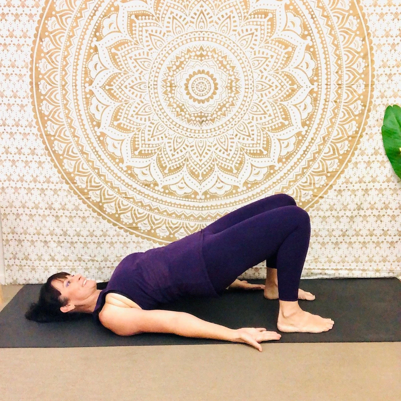 Jodie from Kevala Health demonstrating the bridge pose for beginners