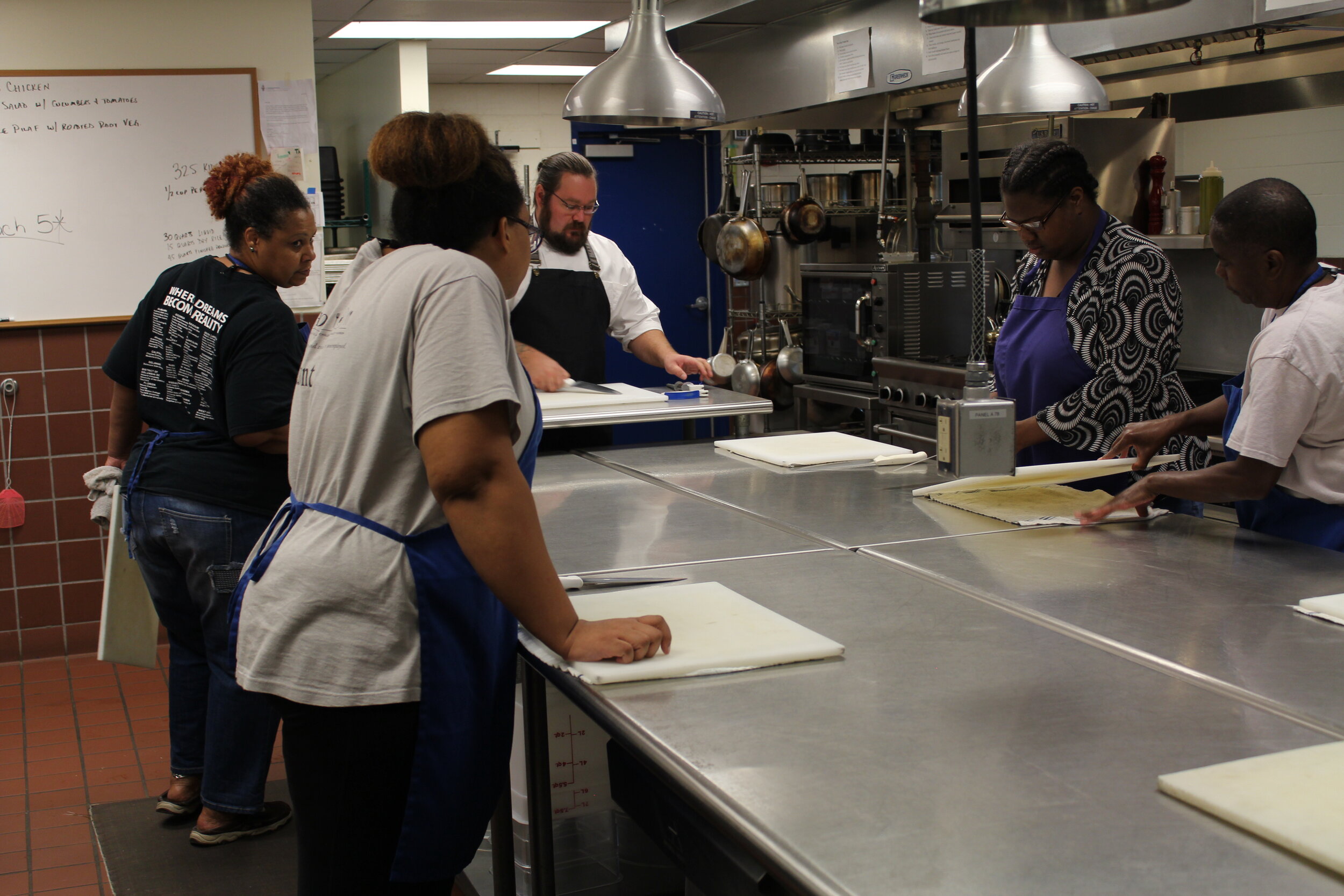  Chef Tobin teaches a culinary school class. 
