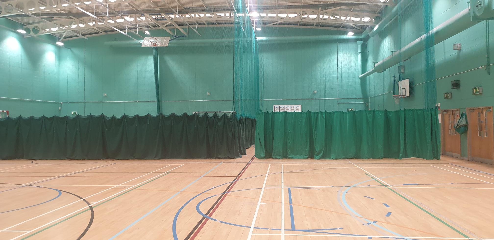 New Division Net and Rehang of Existing Site Screens