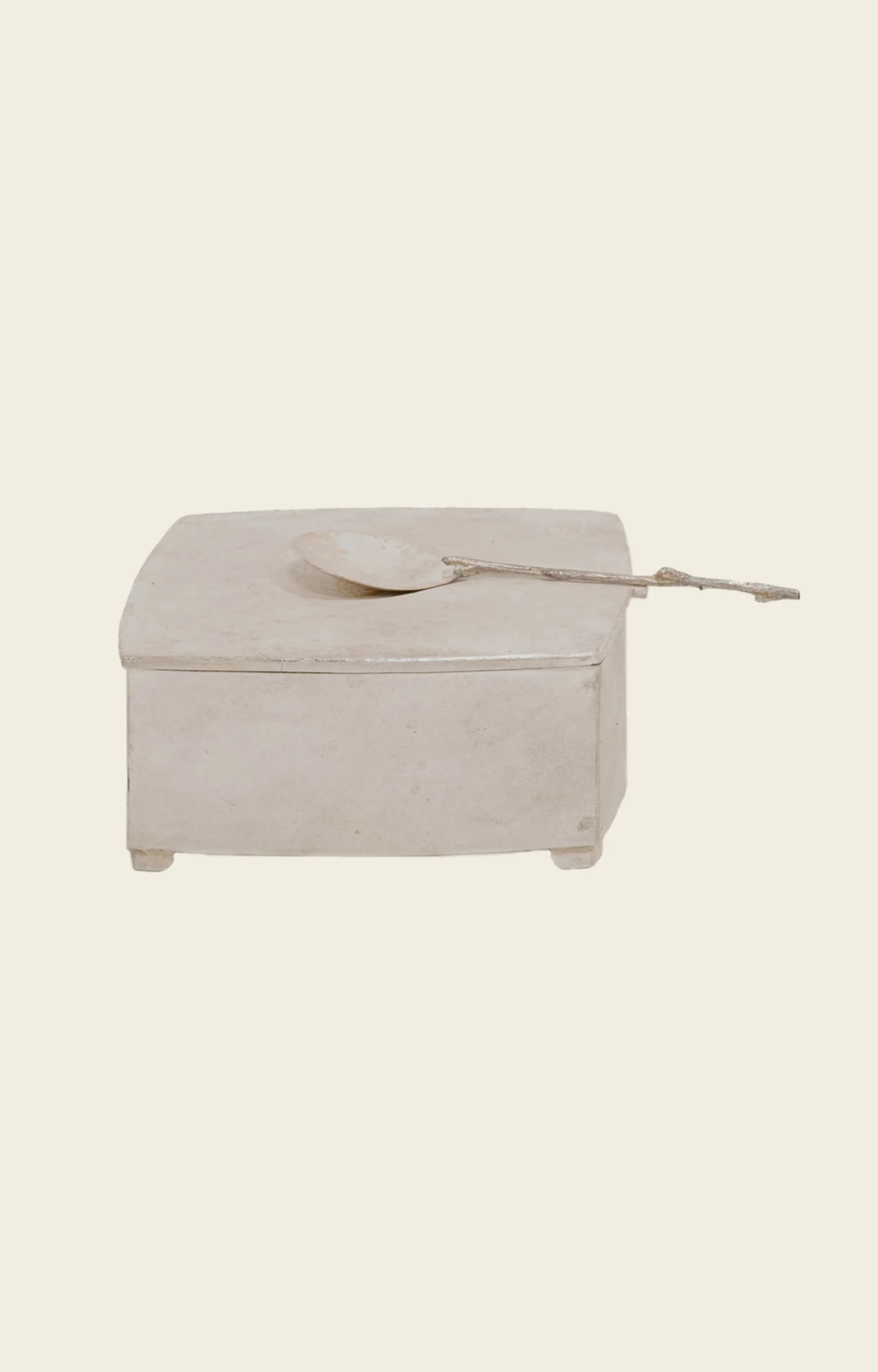 A Dhoemi Turtleneck and Glassware by Akua Objects