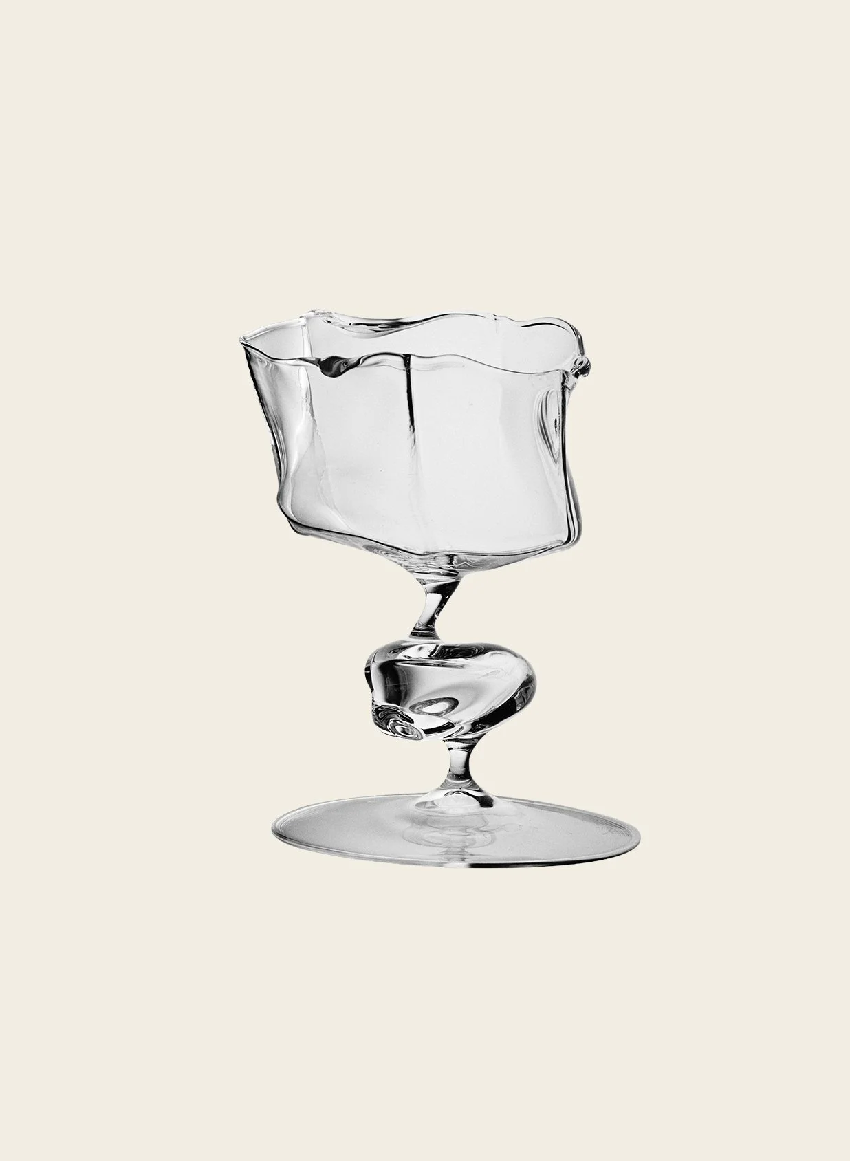 A Mouthblown Glass Piece and a Loewe Handbag
