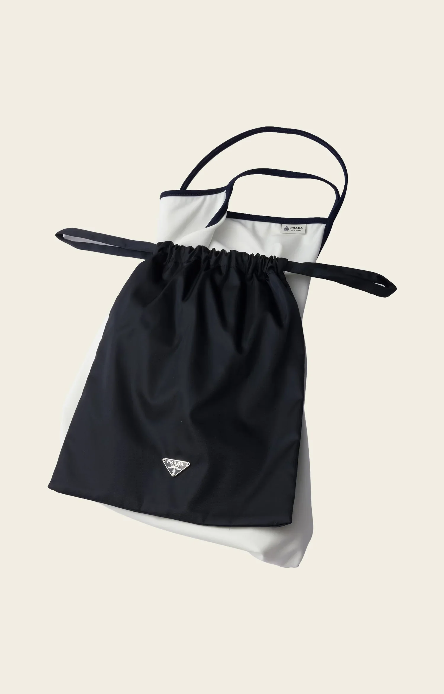 Prada Swimwear and a Gardener’s Mule