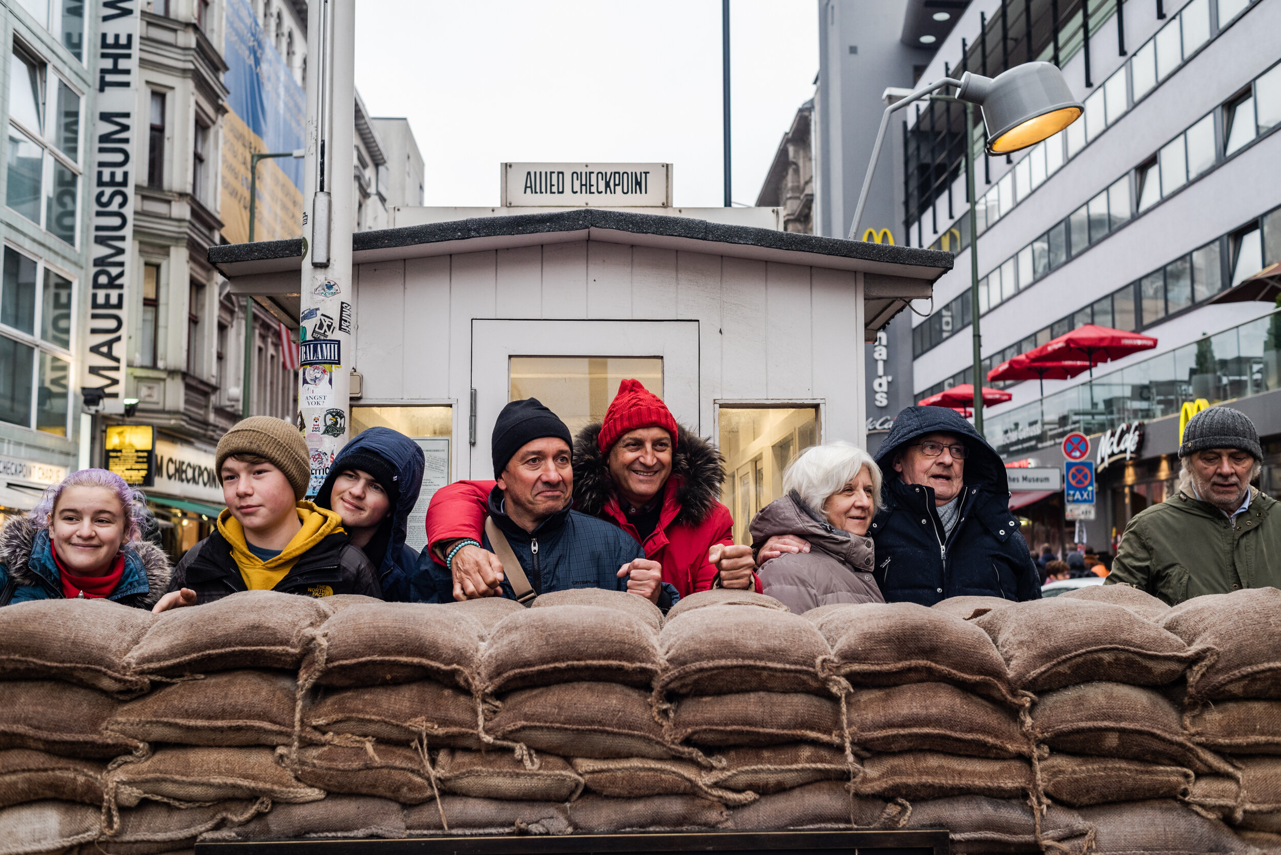  People taking photos at the Checkpoint Charlie. 