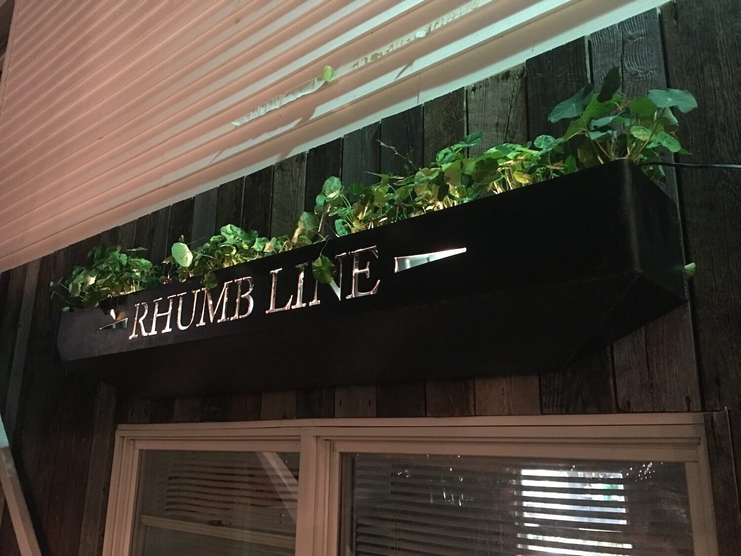 Rhumbline Custom Metal Sign.JPG