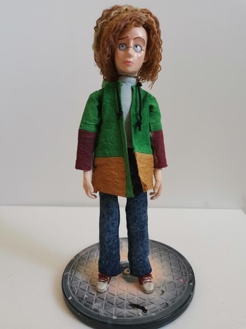 completed stop motion animation puppet featuring hand-made costume.
