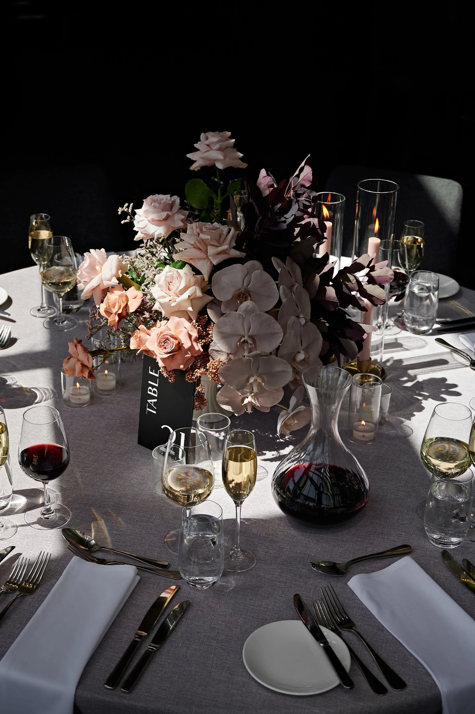 Beautiful hospitality photography: table setting with flowers and wine by Charlotte Orr, photographer based in Melbourne, Australia