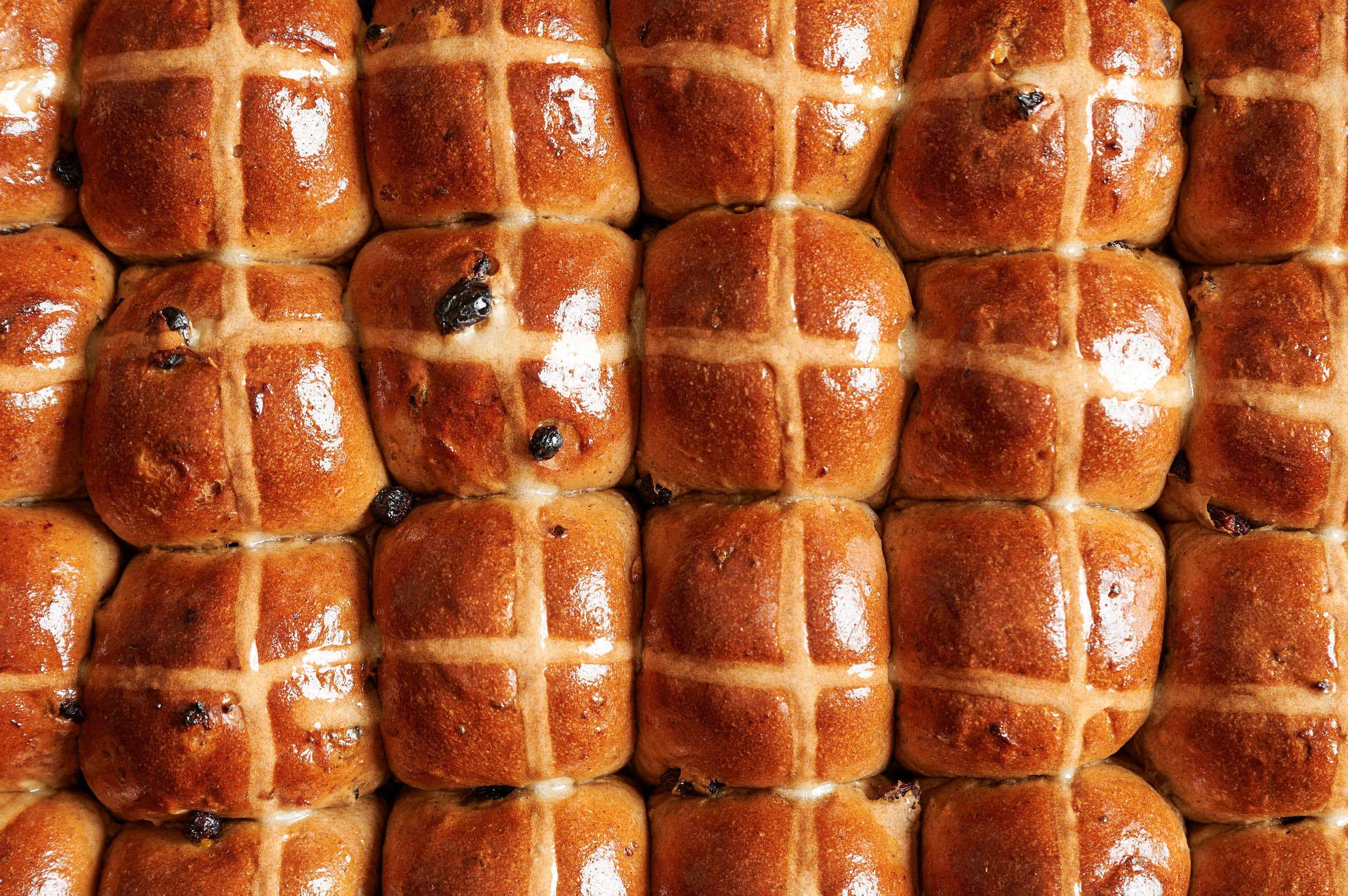 Editorial food photography: fresh hot cross buns from above by Melbourne food photographer Charlotte Orr