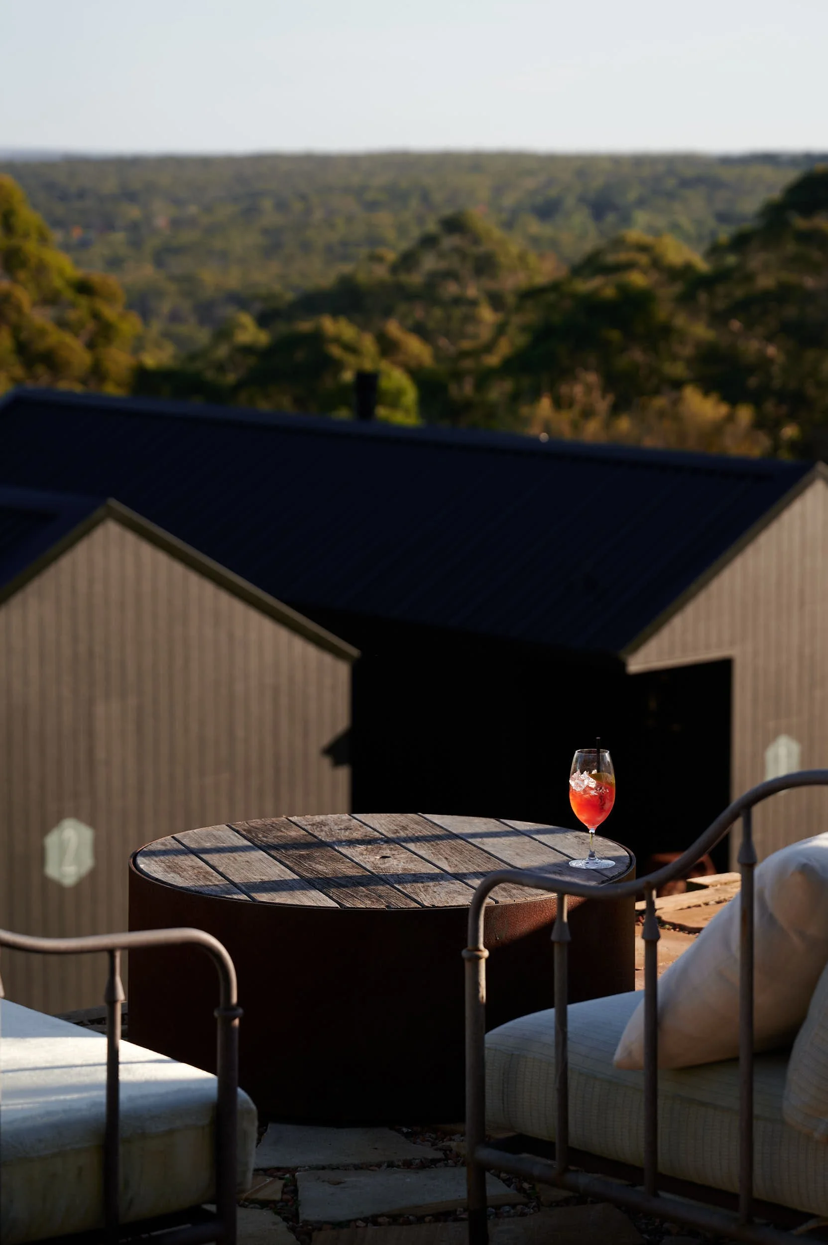 Beautiful hospitality photography: cocktail on outdoor table by Charlotte Orr, photographer based in Melbourne, Australia