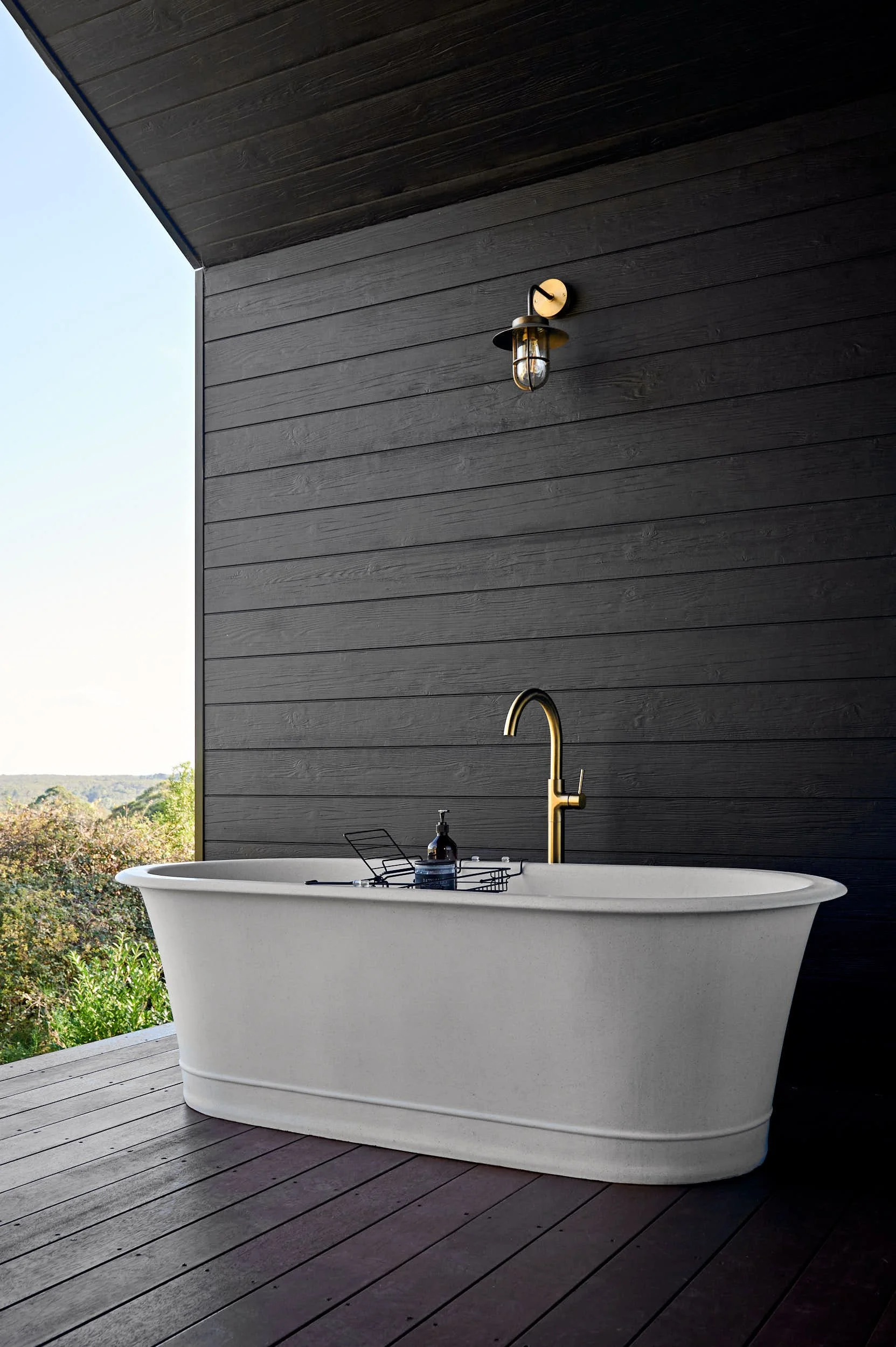 Beautiful hospitality photography: outdoor bath with view by Charlotte Orr, photographer based in Melbourne, Australia