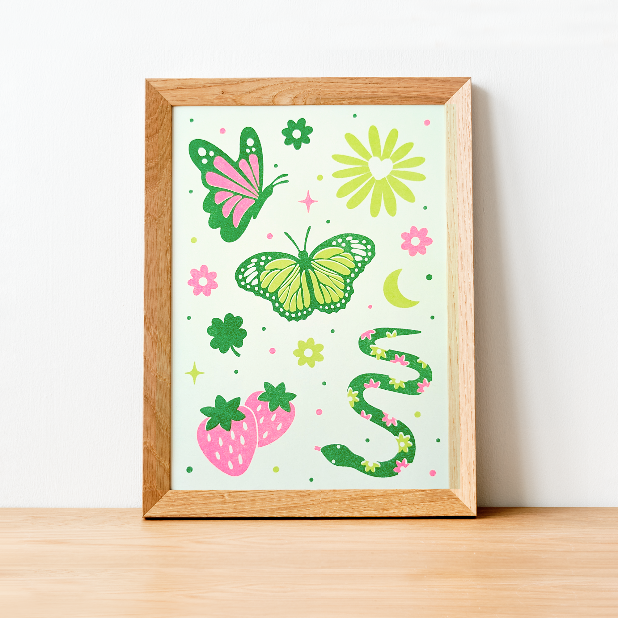 in the garden butterfly print in wood frame.png