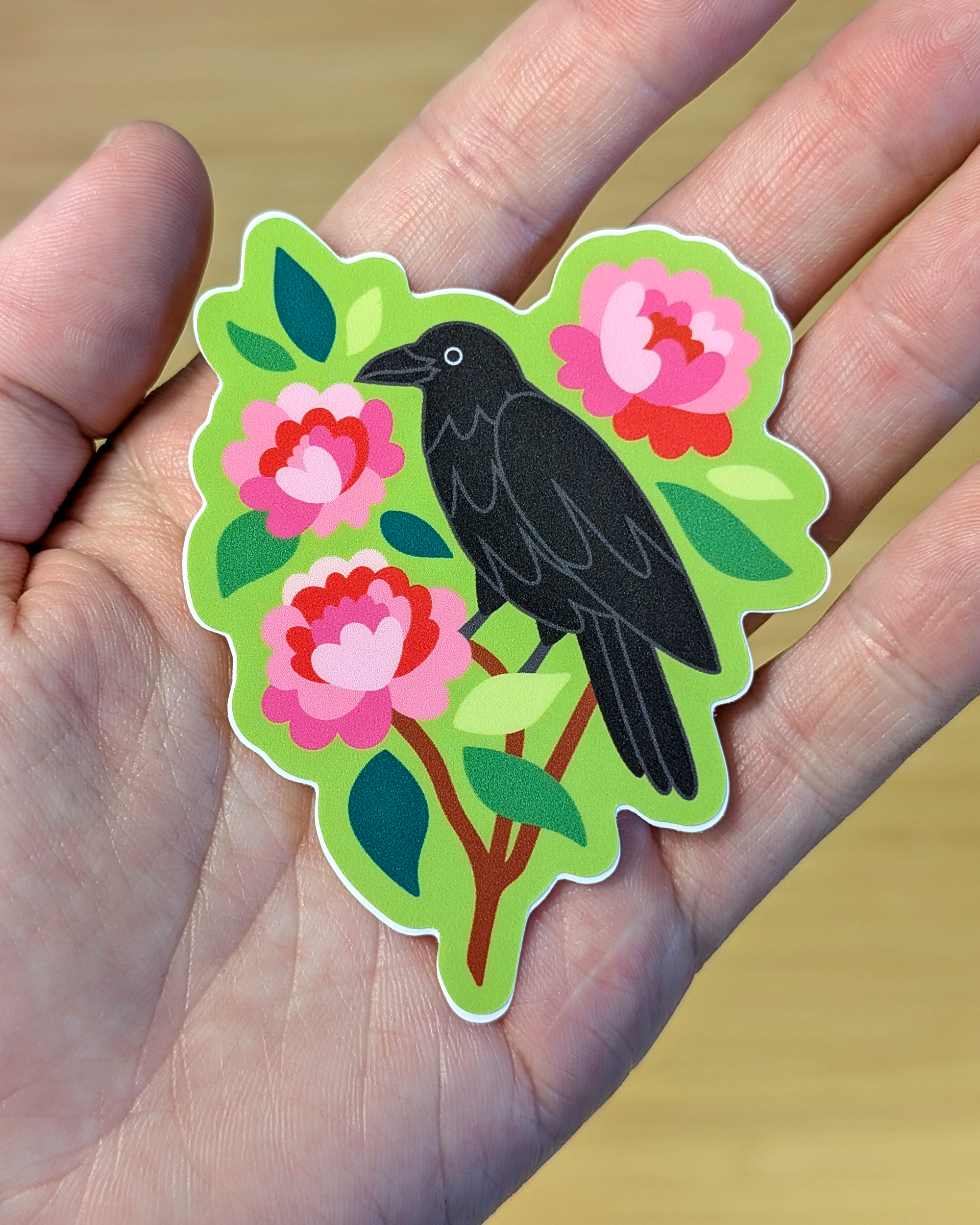 crow and peonies stickers in hand.png